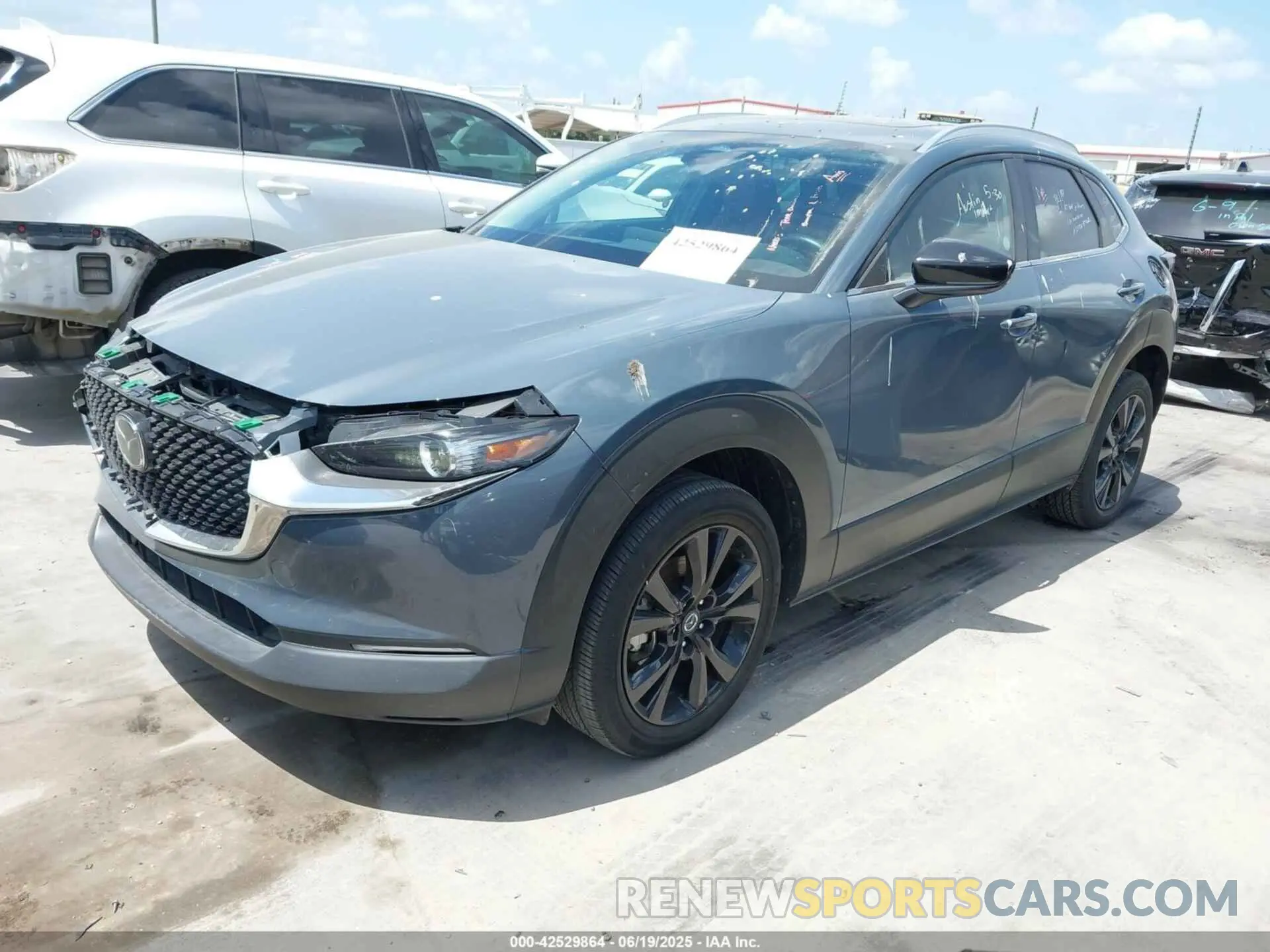 2 Photograph of a damaged car 3MVDMBCM4RM651155 MAZDA CX-30 2024
