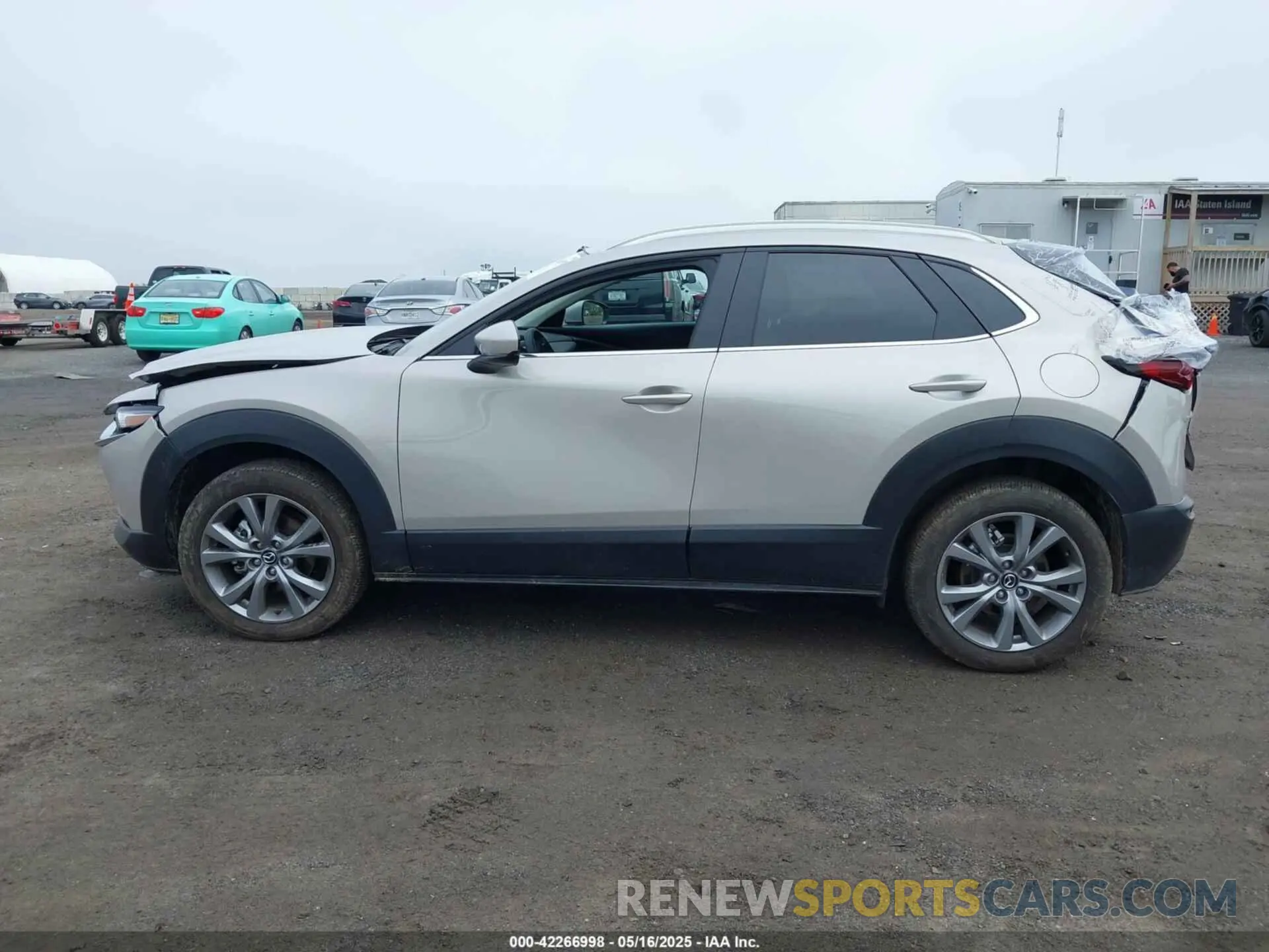 14 Photograph of a damaged car 3MVDMBCM7RM702714 MAZDA CX-30 2024