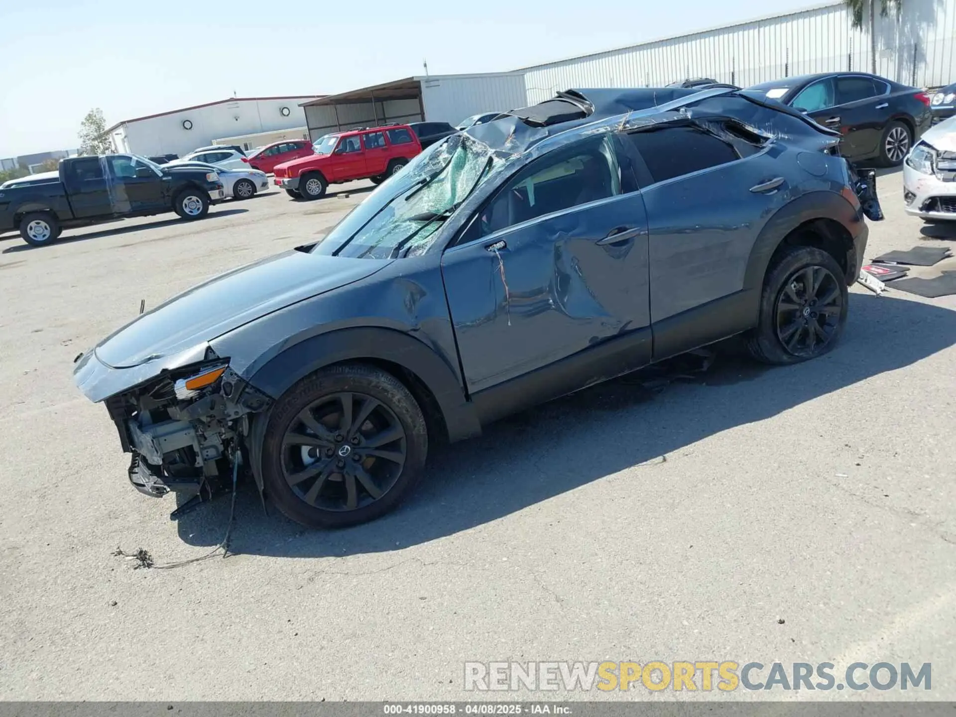 2 Photograph of a damaged car 3MVDMBCMXRM640631 MAZDA CX-30 2024