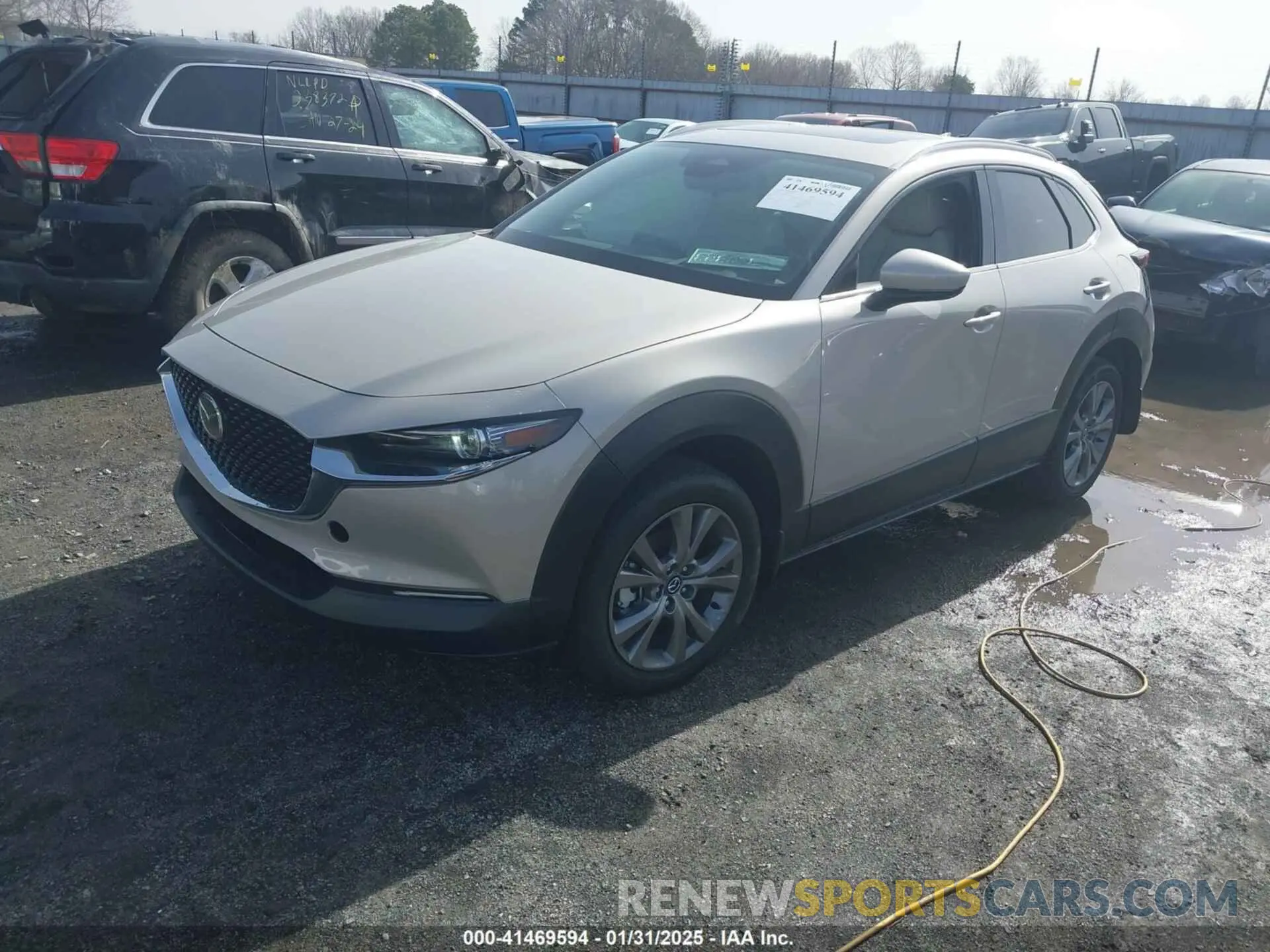 2 Photograph of a damaged car 3MVDMBDM3RM675235 MAZDA CX-30 2024