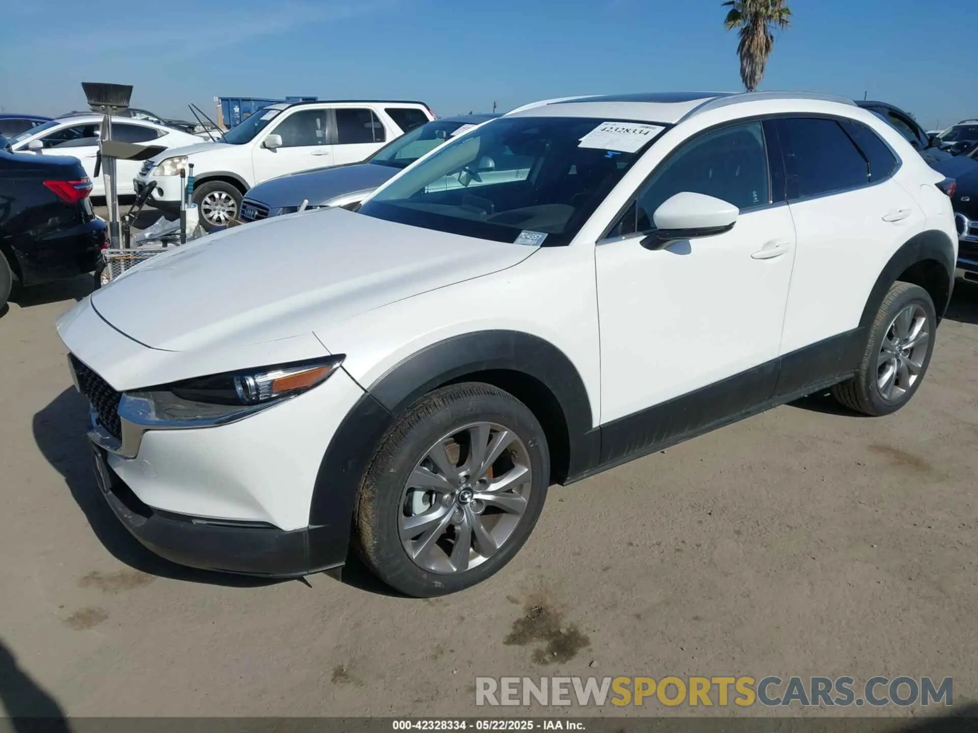 2 Photograph of a damaged car 3MVDMBDM4RM616159 MAZDA CX-30 2024