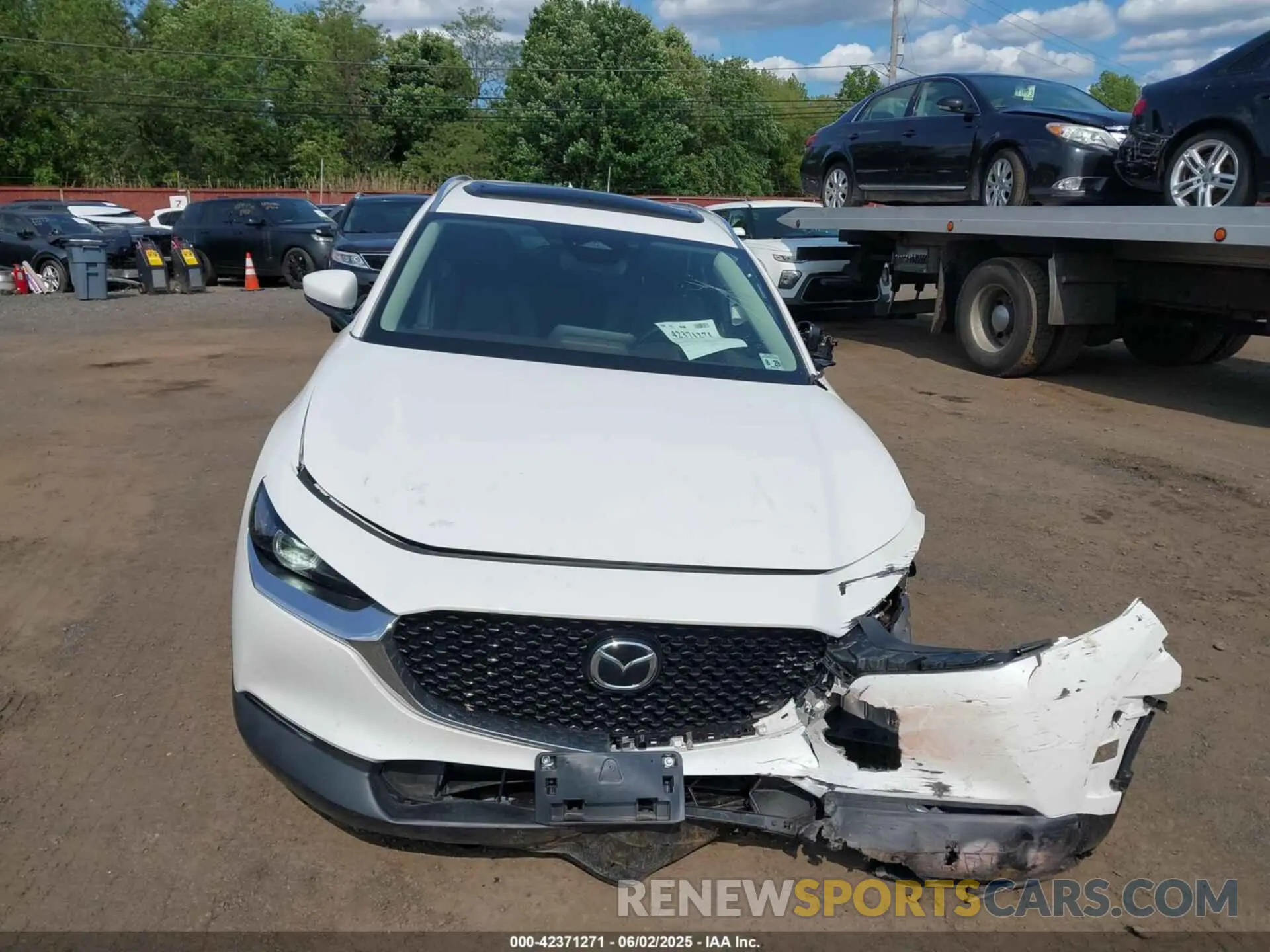 12 Photograph of a damaged car 3MVDMBDM9RM656463 MAZDA CX-30 2024