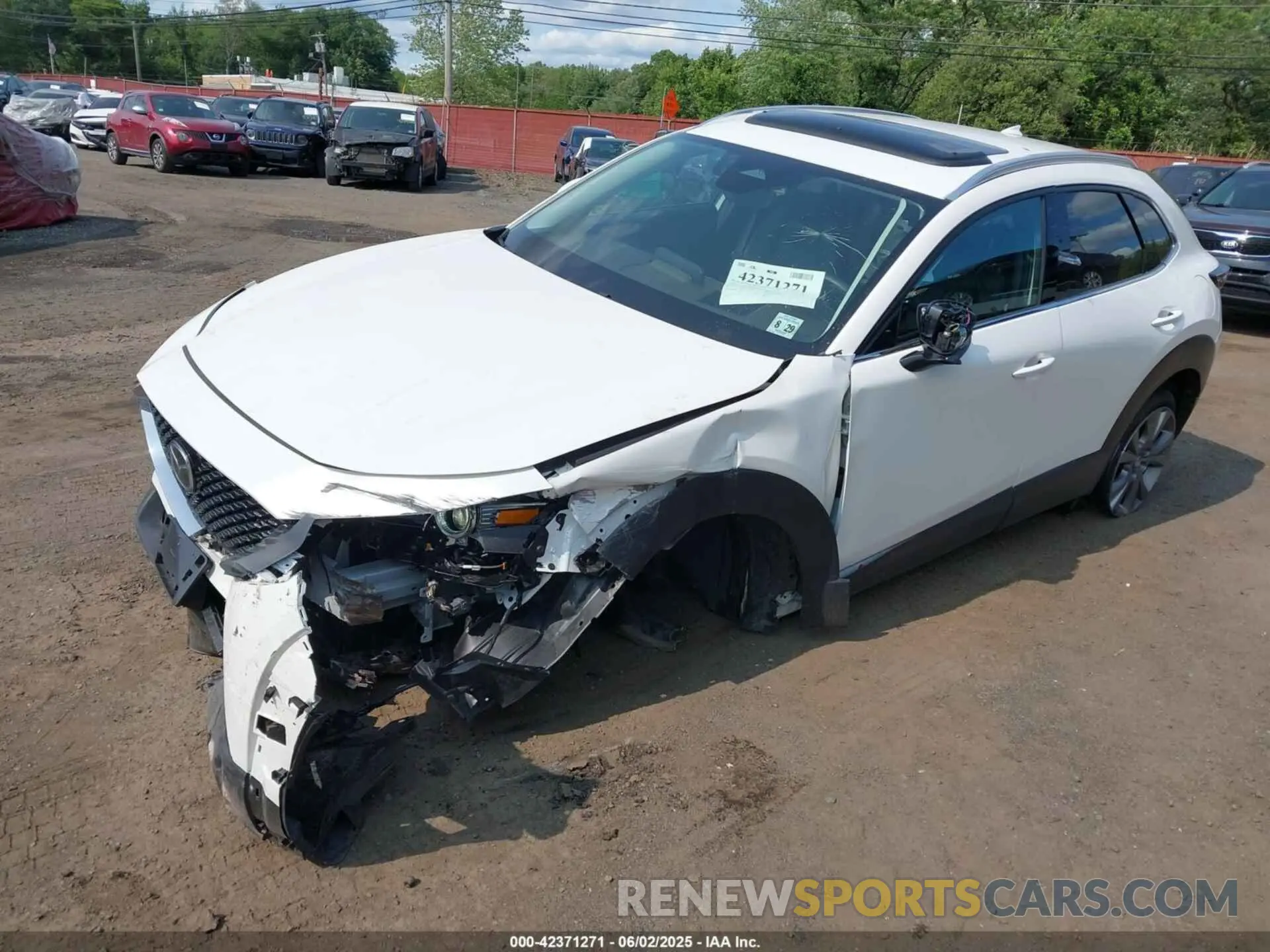 2 Photograph of a damaged car 3MVDMBDM9RM656463 MAZDA CX-30 2024