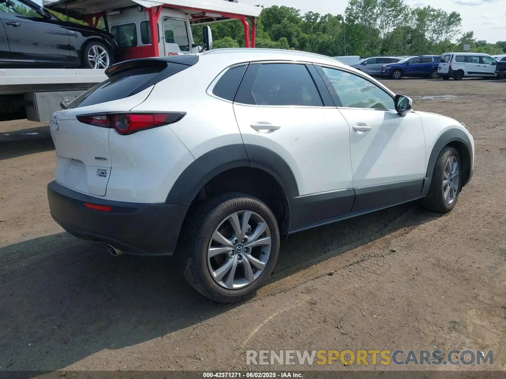 4 Photograph of a damaged car 3MVDMBDM9RM656463 MAZDA CX-30 2024