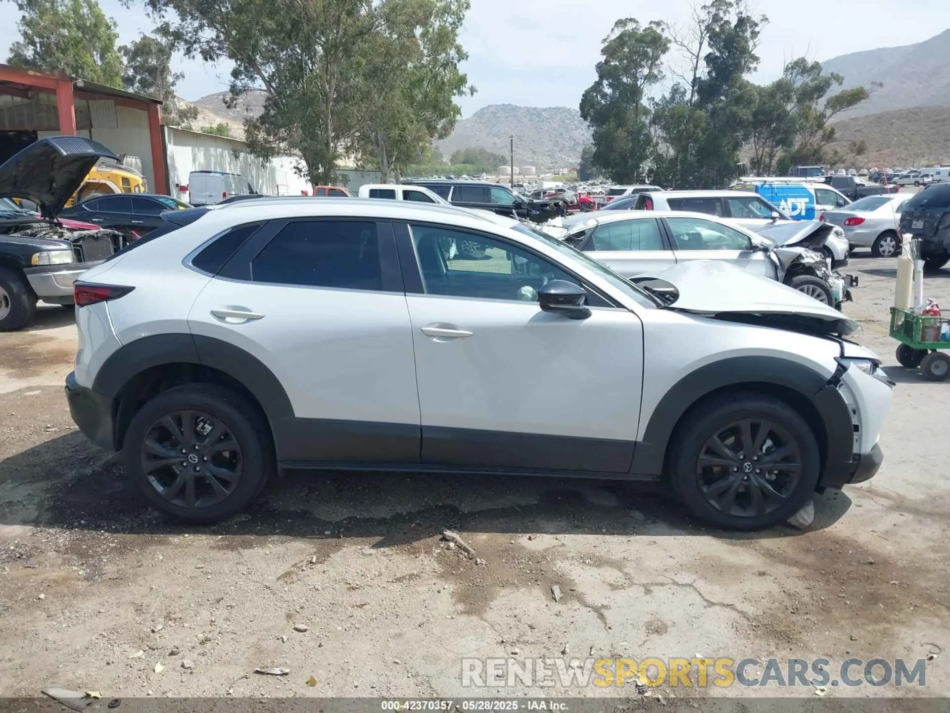 13 Photograph of a damaged car 3MVDMBBM4SM771254 MAZDA CX-30 2025