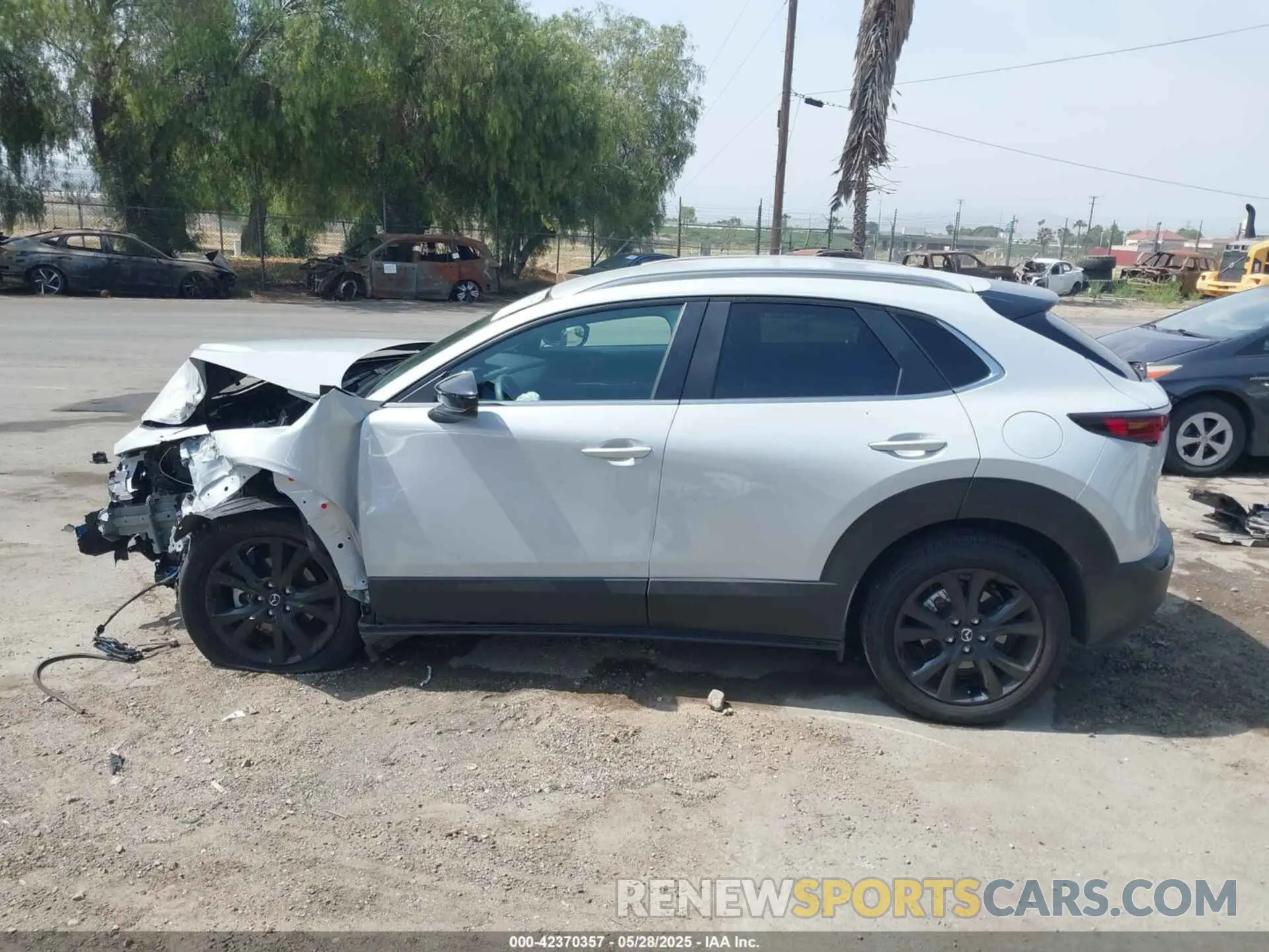 14 Photograph of a damaged car 3MVDMBBM4SM771254 MAZDA CX-30 2025