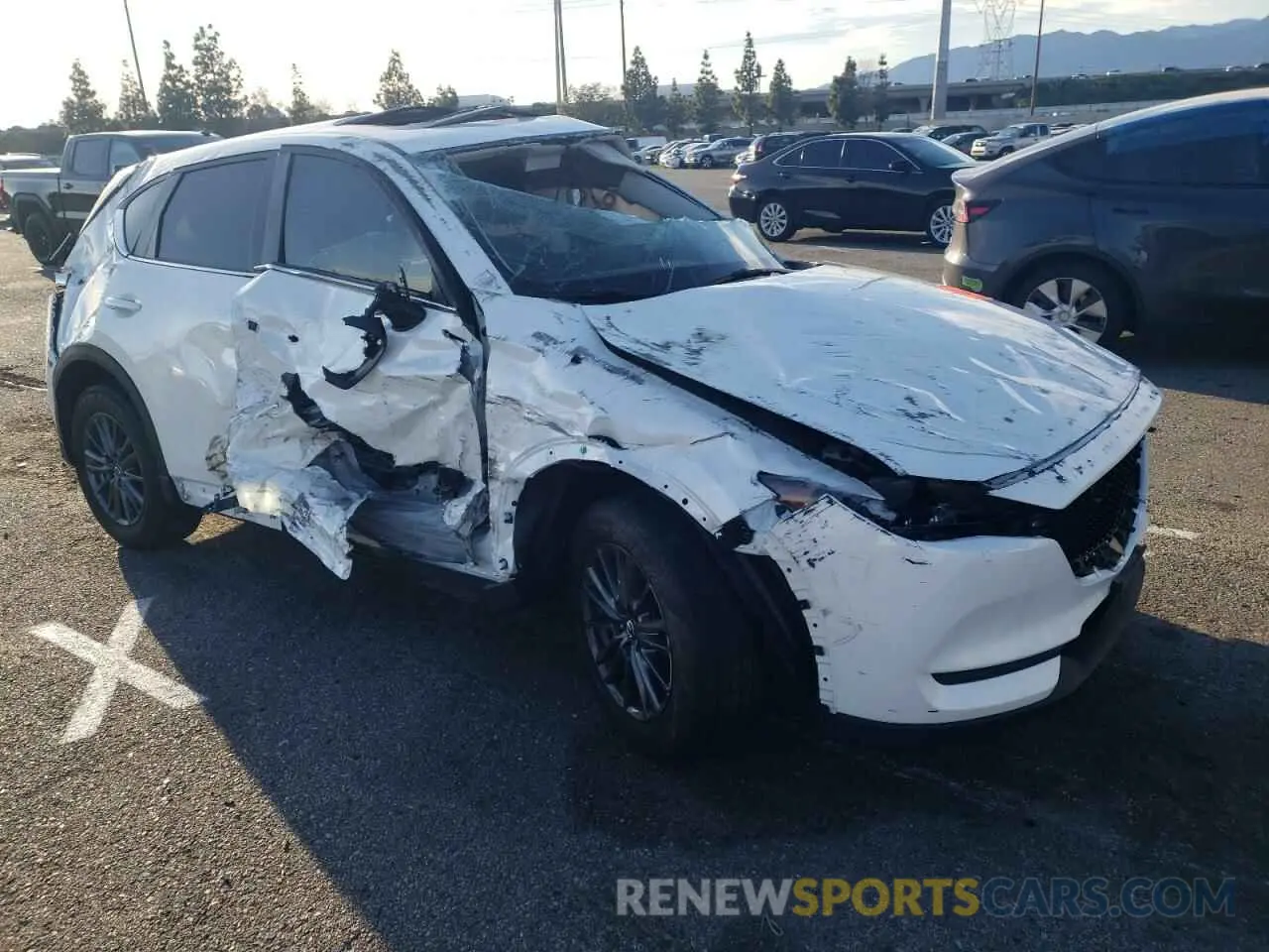 4 Photograph of a damaged car JM3KFACM9M0386409 MAZDA CX-5 2021