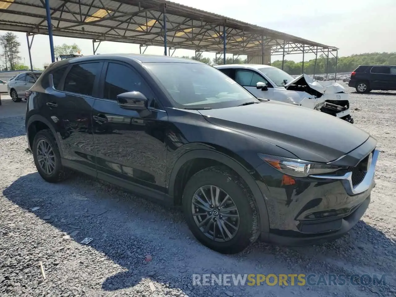 4 Photograph of a damaged car JM3KFACMXM0425900 MAZDA CX-5 2021