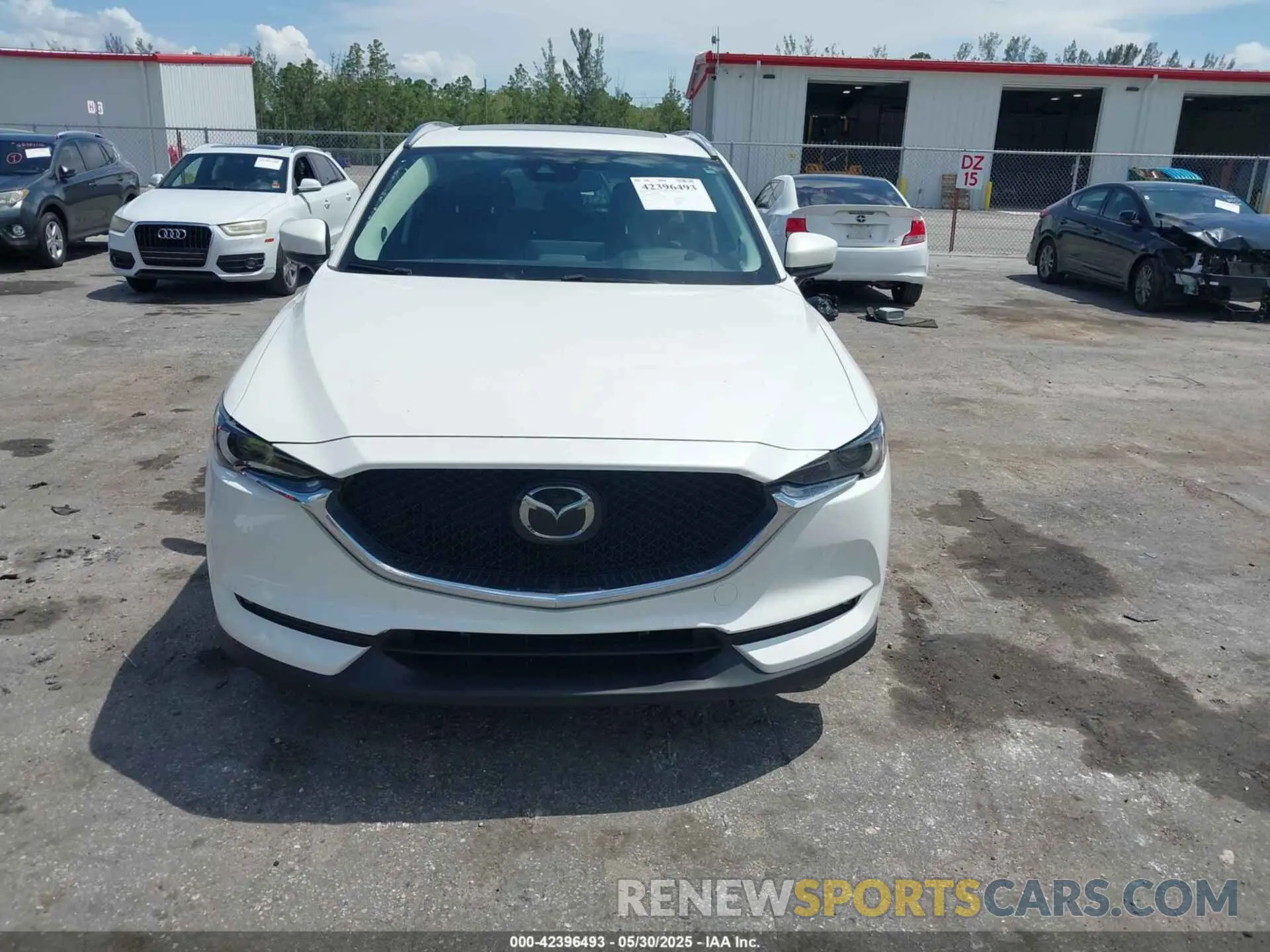 12 Photograph of a damaged car JM3KFADM9M0471104 MAZDA CX-5 2021