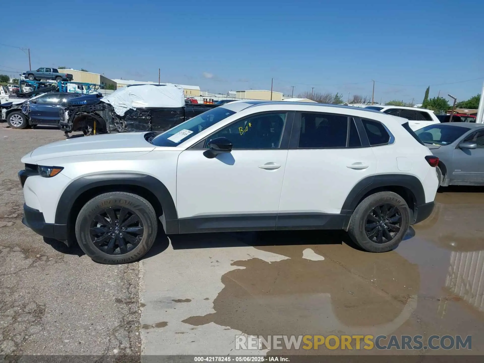 14 Photograph of a damaged car 7MMVABCM7PN142159 MAZDA CX-50 2023