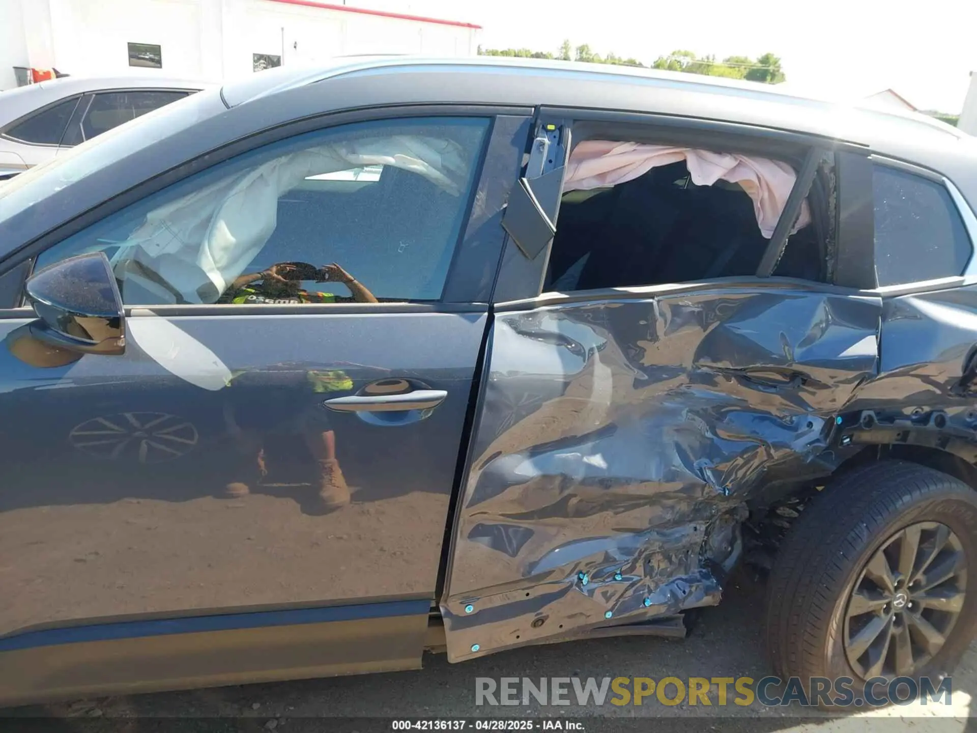 14 Photograph of a damaged car 7MMVABAM5RN192435 MAZDA CX-50 2024
