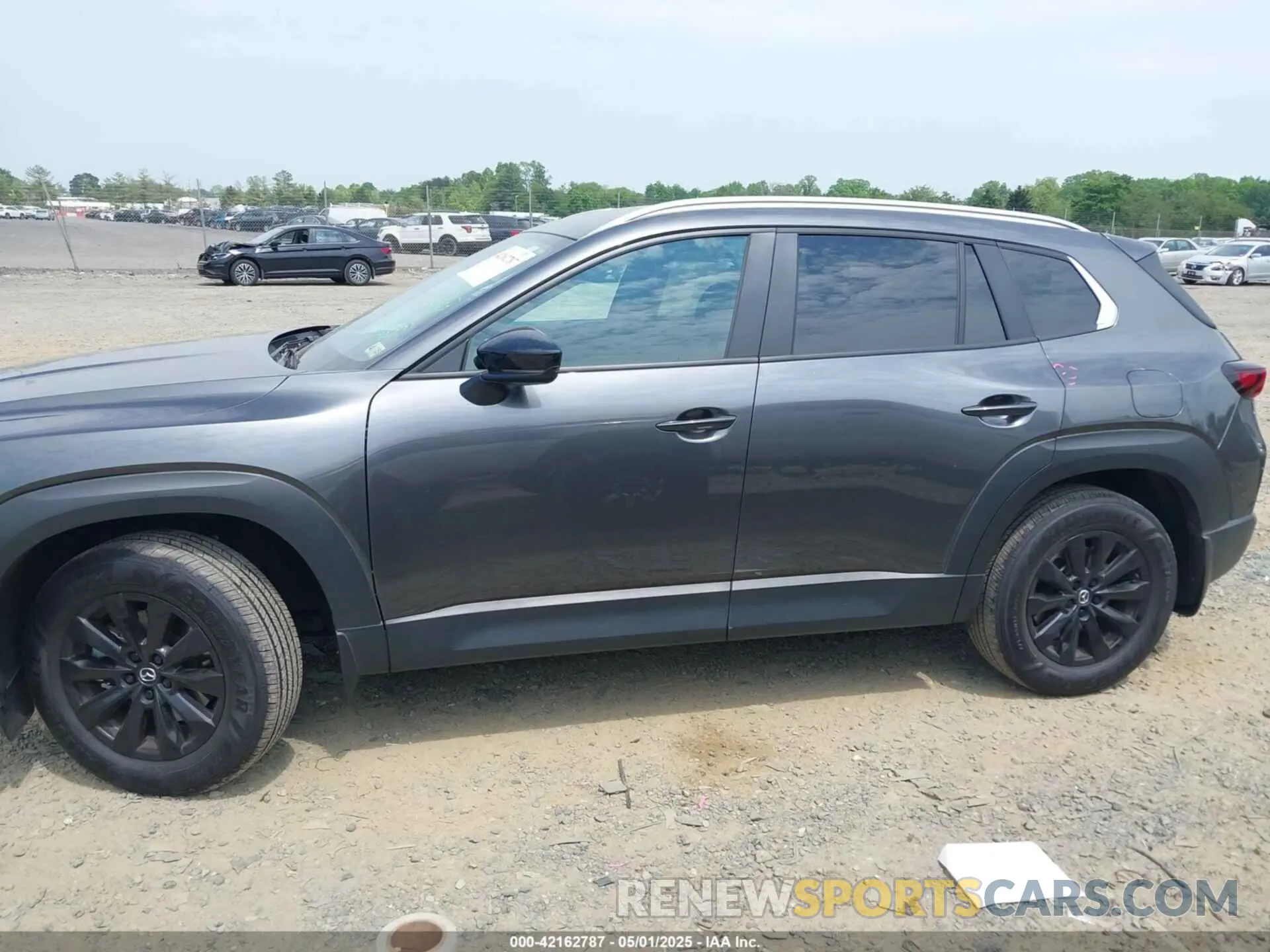 14 Photograph of a damaged car 7MMVABBM3RN212440 MAZDA CX-50 2024