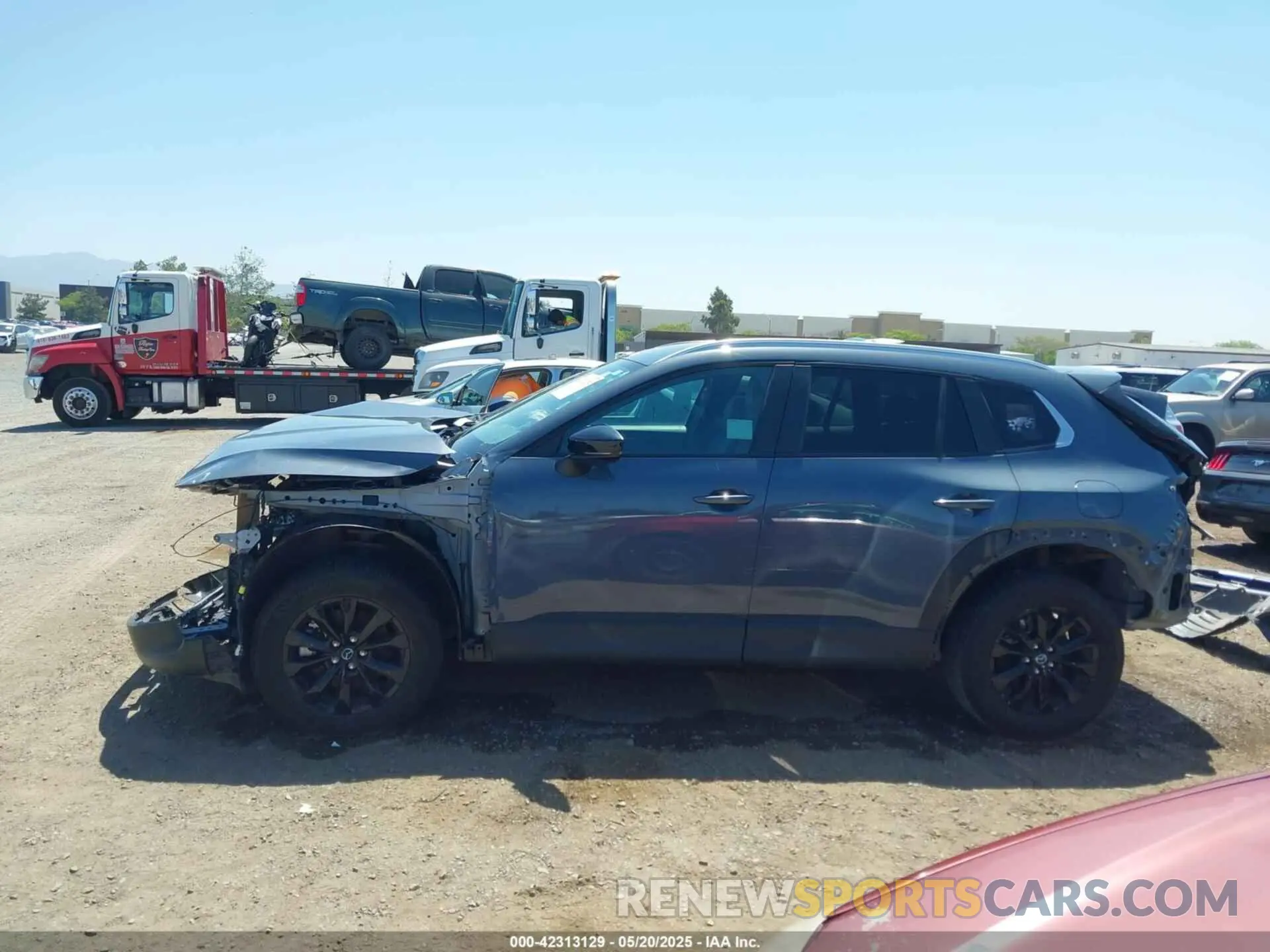 14 Photograph of a damaged car 7MMVABBM7RN165817 MAZDA CX-50 2024