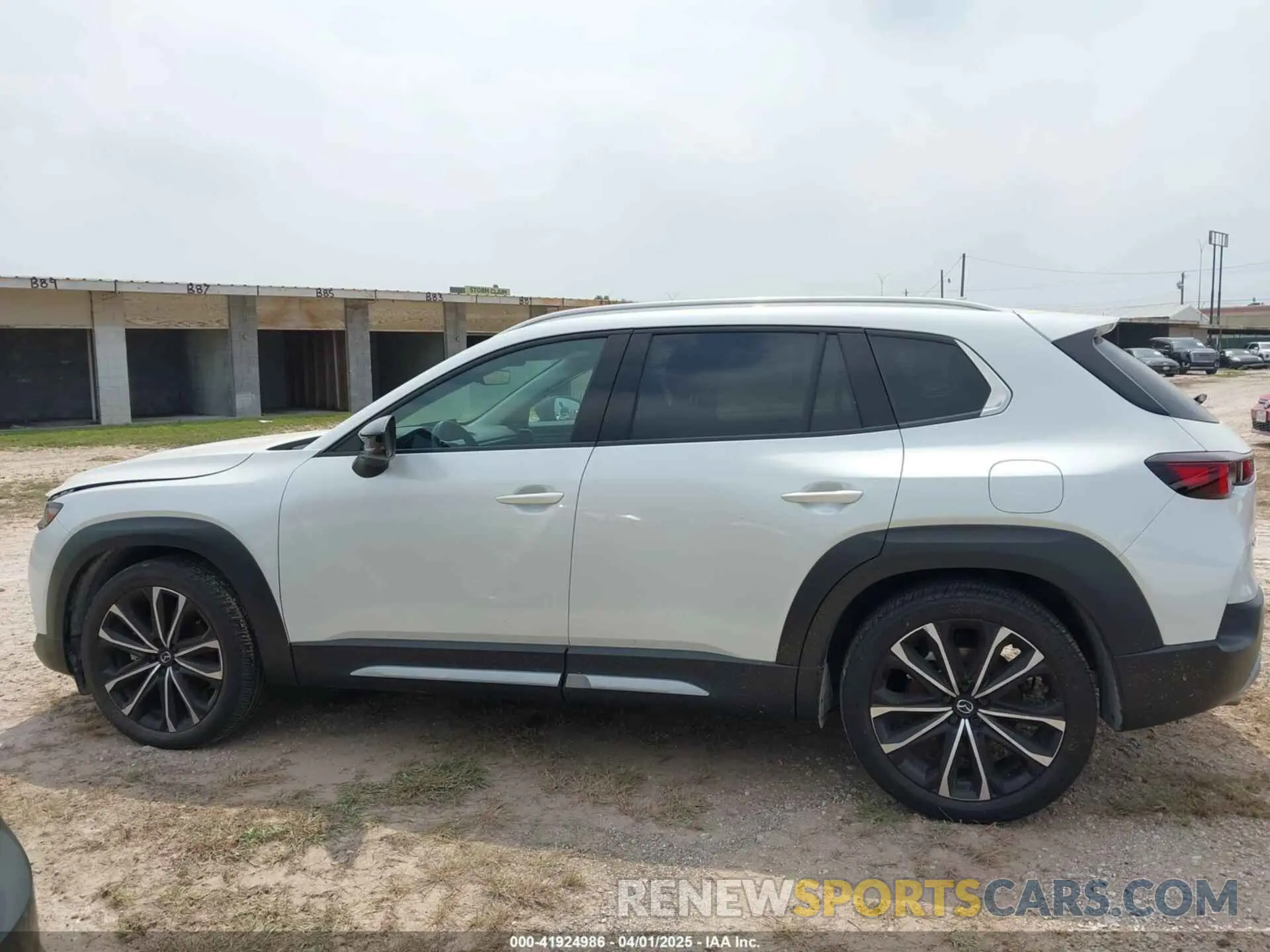 14 Photograph of a damaged car 7MMVABDY3RN174014 MAZDA CX-50 2024