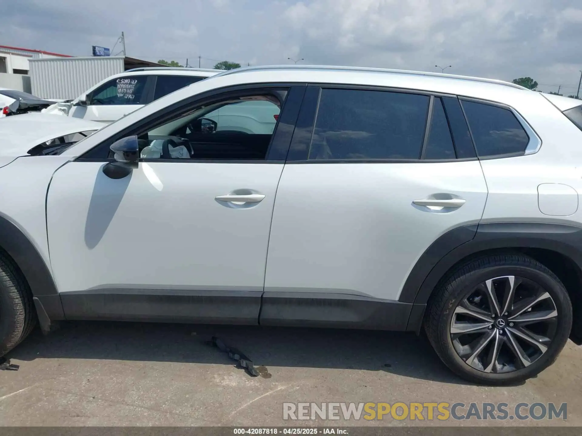 14 Photograph of a damaged car 7MMVABDY4RN214648 MAZDA CX-50 2024