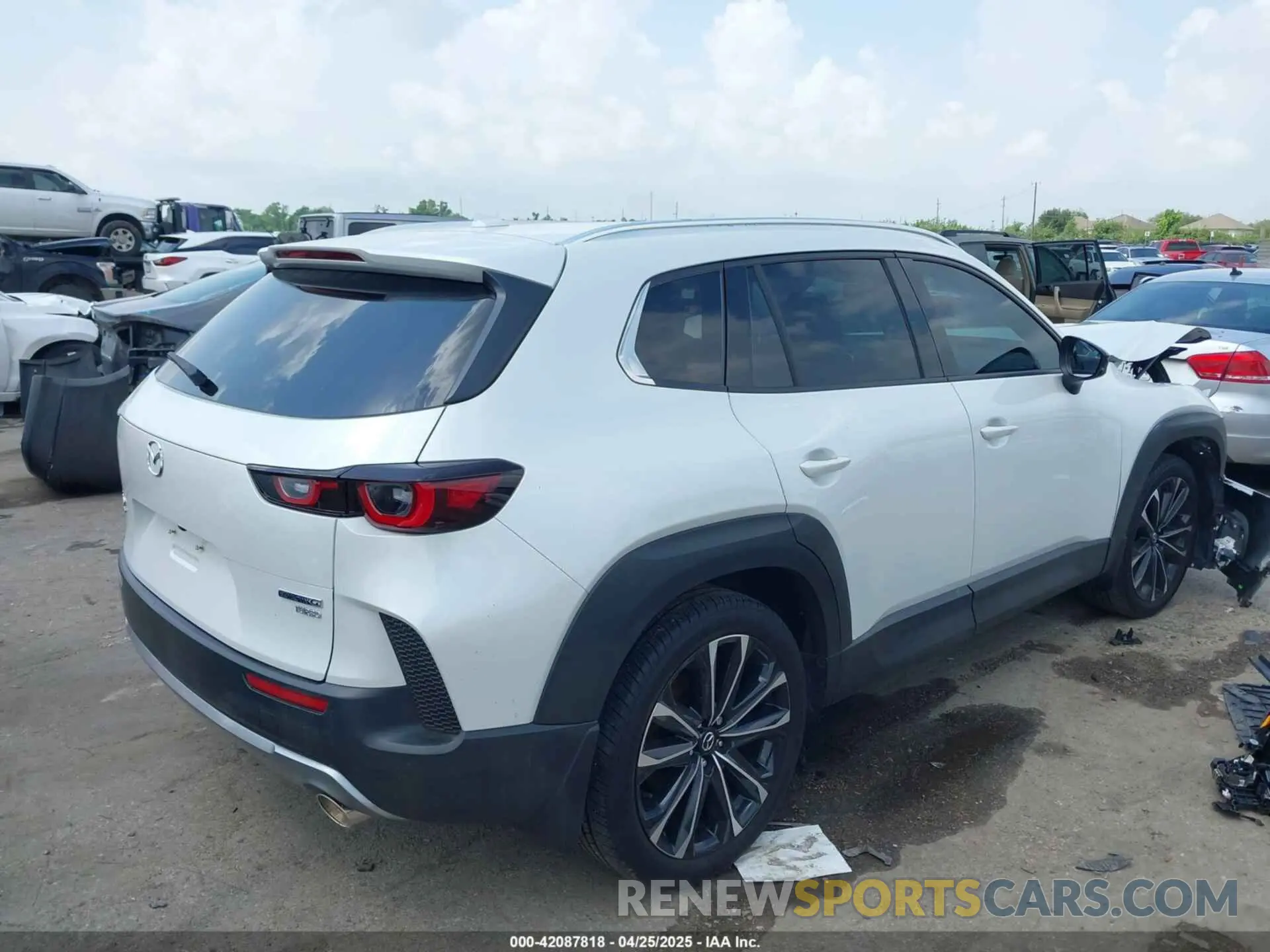 4 Photograph of a damaged car 7MMVABDY4RN214648 MAZDA CX-50 2024