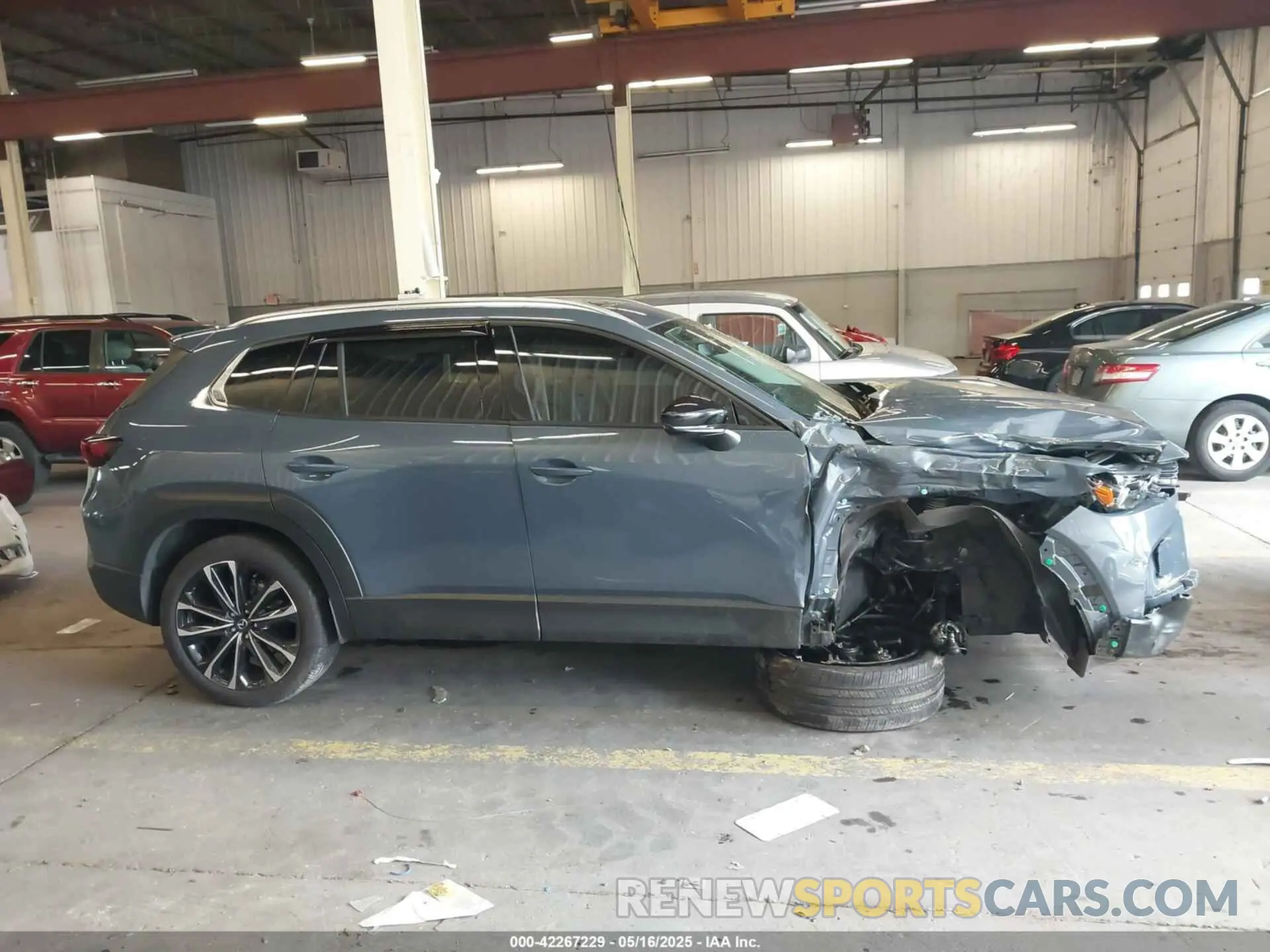13 Photograph of a damaged car 7MMVABEM7RN194987 MAZDA CX-50 2024