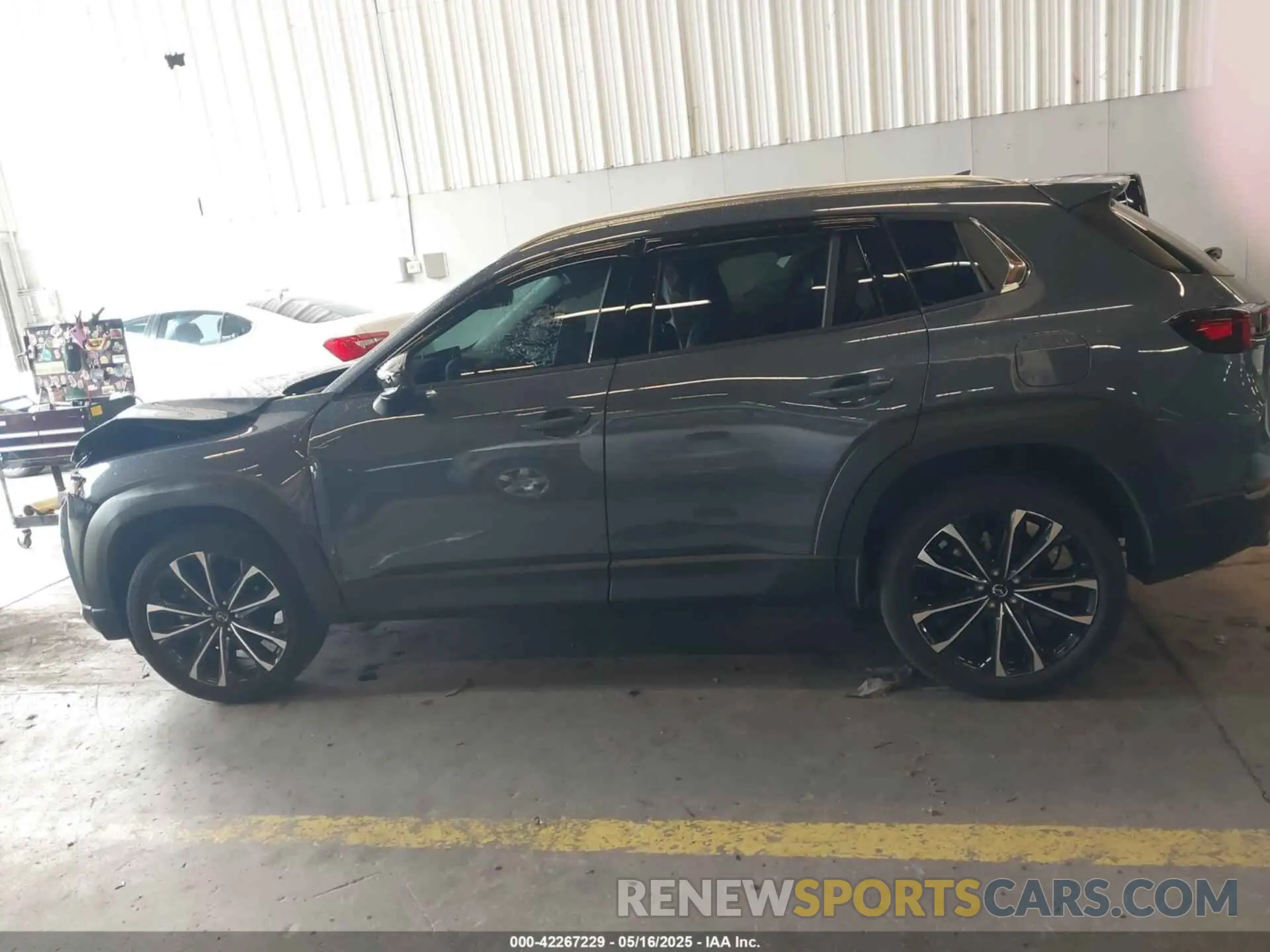 14 Photograph of a damaged car 7MMVABEM7RN194987 MAZDA CX-50 2024