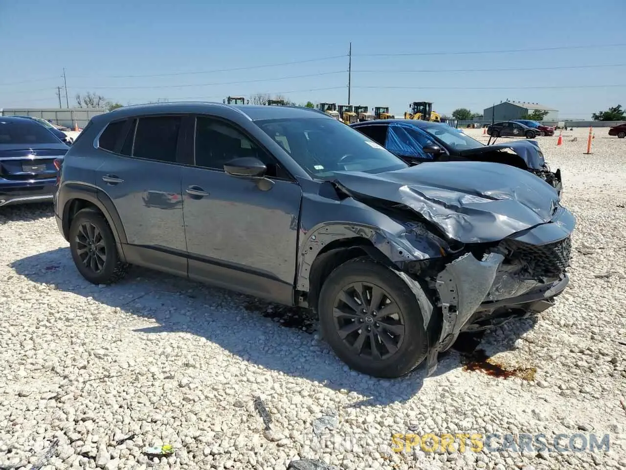 4 Photograph of a damaged car 7MMVABCM5PN110083 MAZDA CX-50 PREF 2023