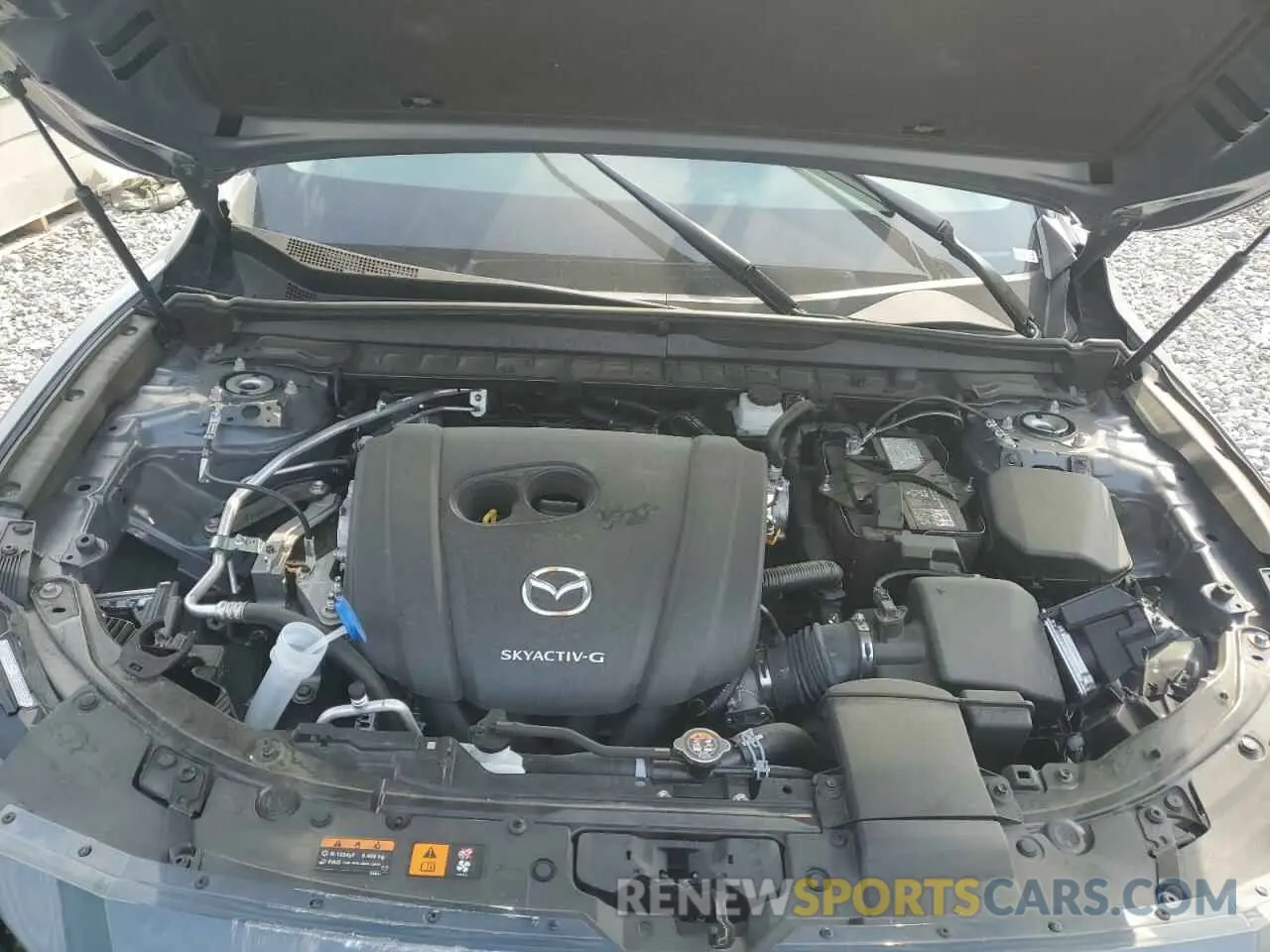 12 Photograph of a damaged car 7MMVABCM5PN136344 MAZDA CX-50 PREF 2023