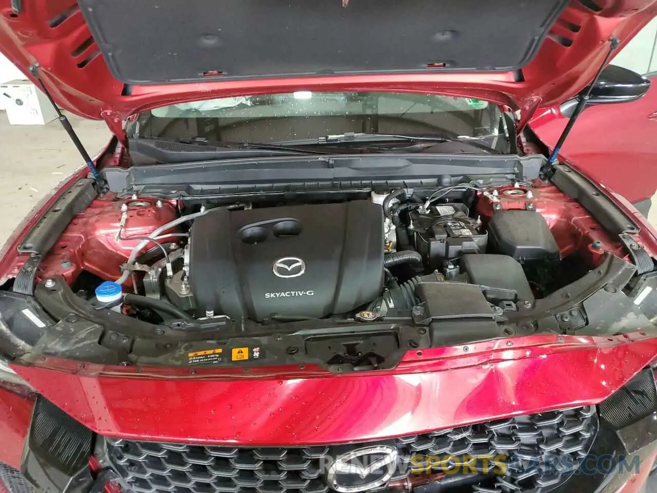 12 Photograph of a damaged car 7MMVABCM9PN125136 MAZDA CX-50 PREF 2023