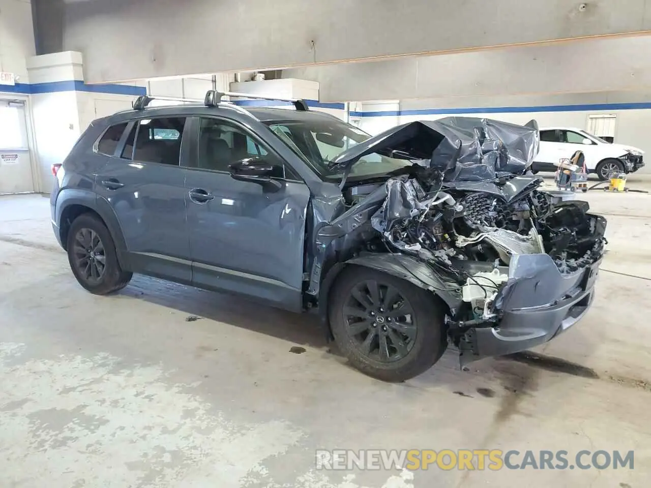 4 Photograph of a damaged car 7MMVABBM5RN195804 MAZDA CX-50 PREF 2024