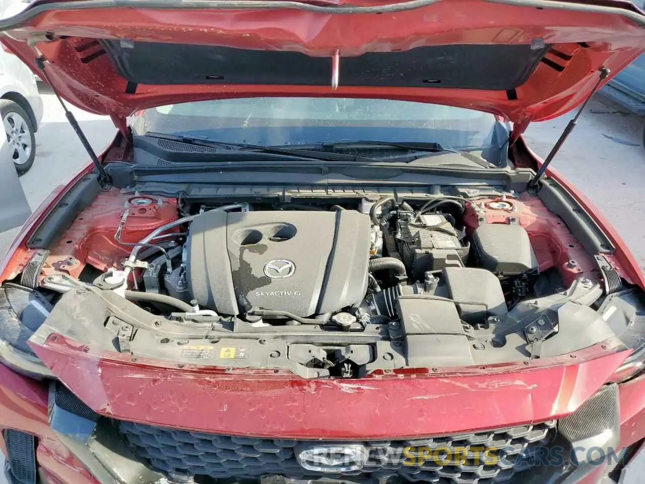 12 Photograph of a damaged car 7MMVABAM7RN194459 MAZDA CX-50 SELE 2024