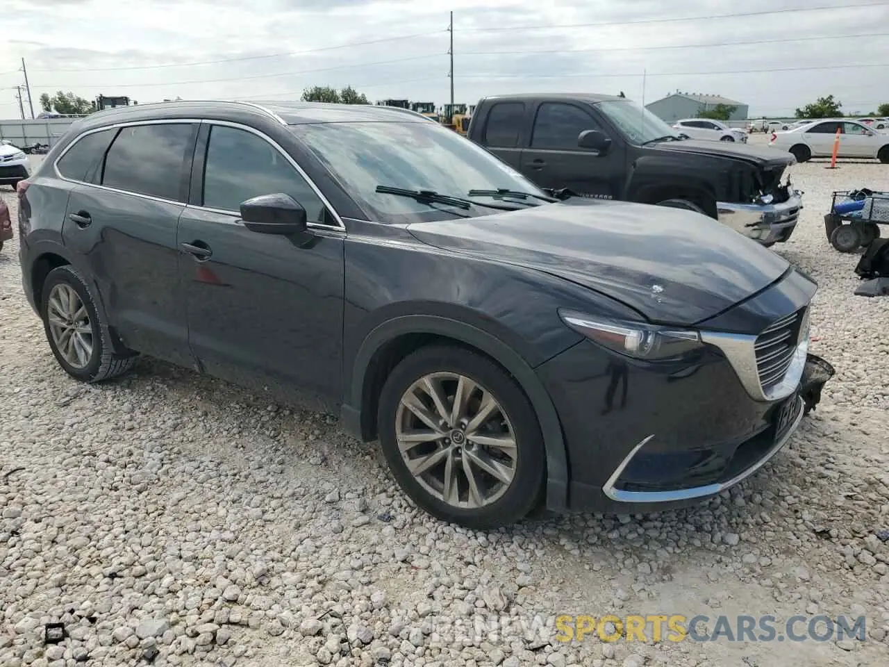 4 Photograph of a damaged car JM3TCBDY8K0303103 MAZDA CX-9 2019