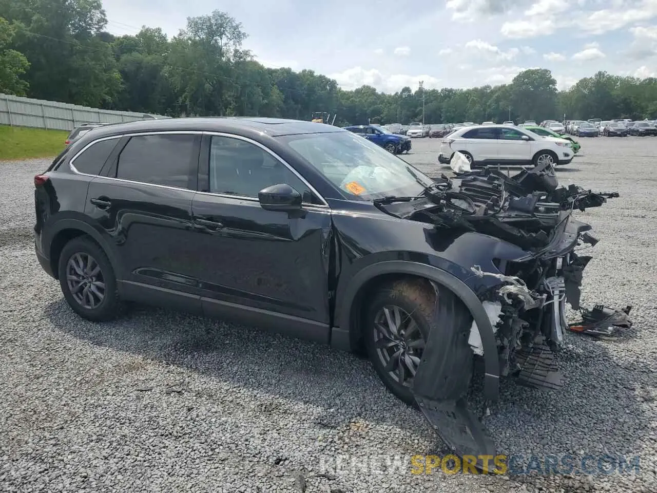 4 Photograph of a damaged car JM3TCBCY1M0502319 MAZDA CX-9 2021