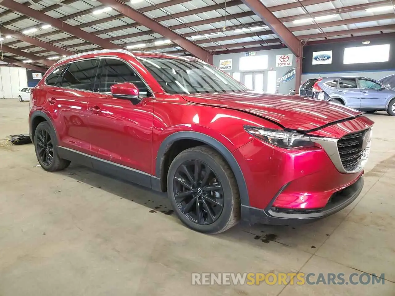 4 Photograph of a damaged car JM3TCBAY6N0615669 MAZDA CX-9 2022