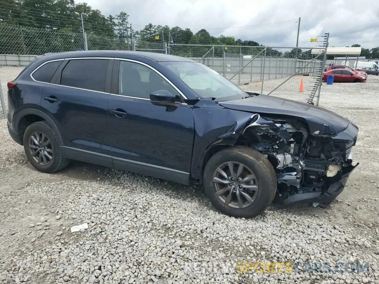 4 Photograph of a damaged car JM3TCBBY0N0608392 MAZDA CX-9 2022