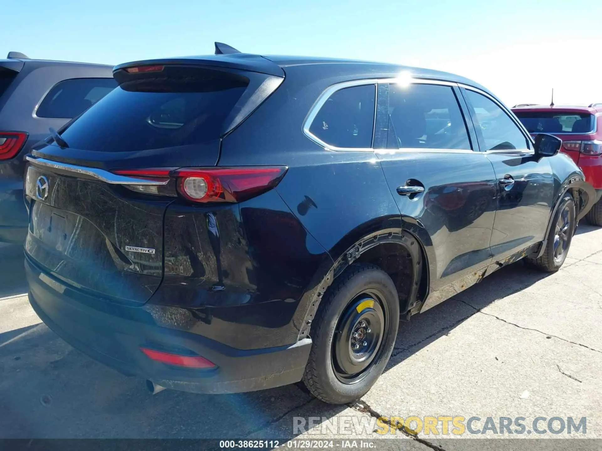 4 Photograph of a damaged car JM3TCBCY1N0601157 MAZDA CX-9 2022