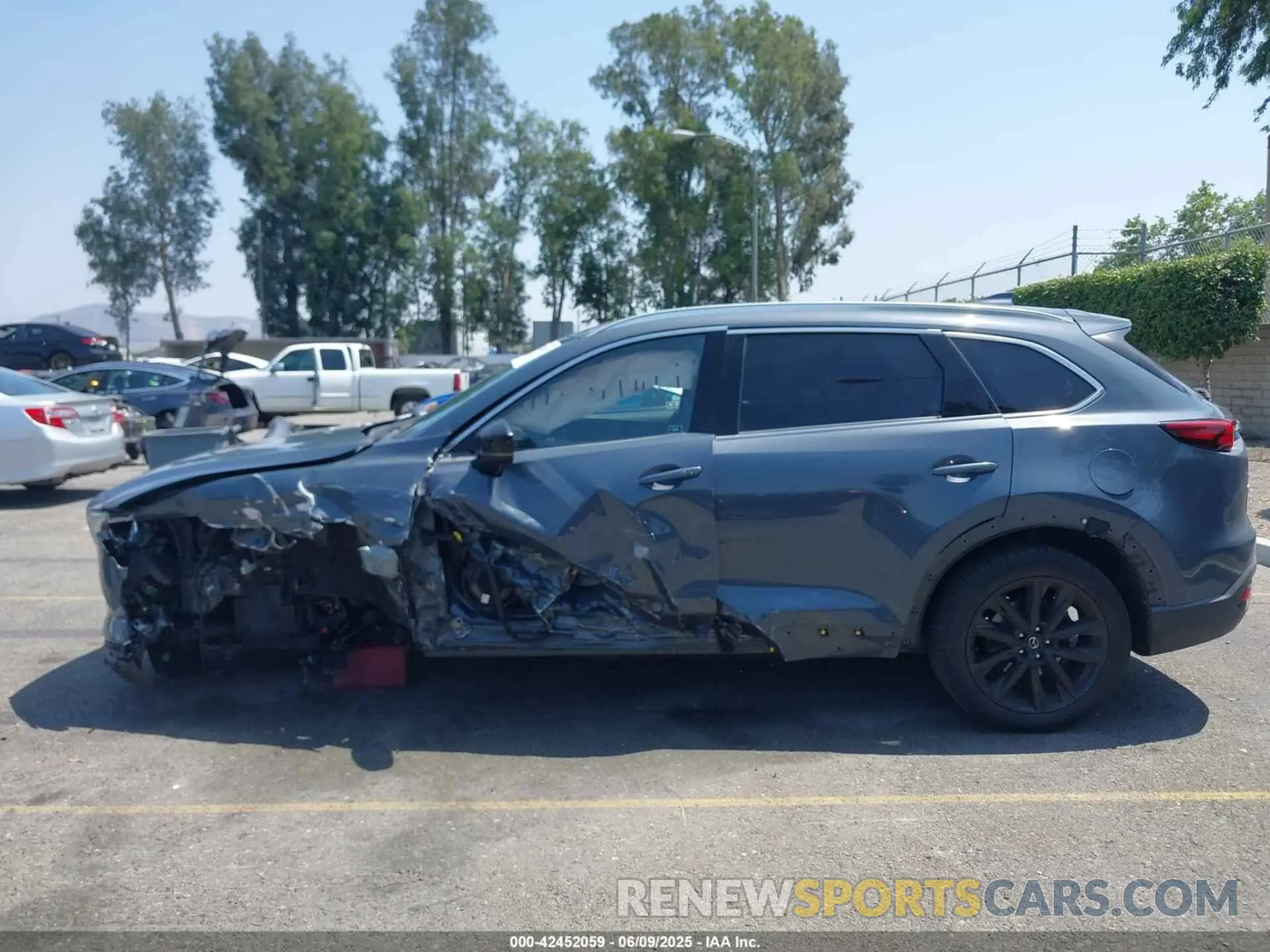 14 Photograph of a damaged car JM3TCBDY1N0611766 MAZDA CX-9 2022