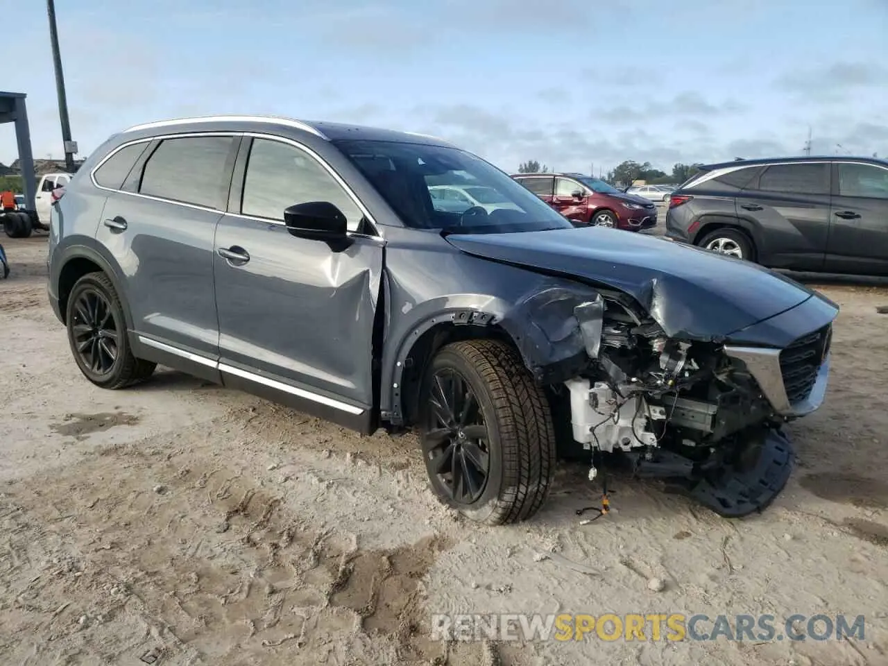 4 Photograph of a damaged car JM3TCBDY5N0625010 MAZDA CX-9 2022