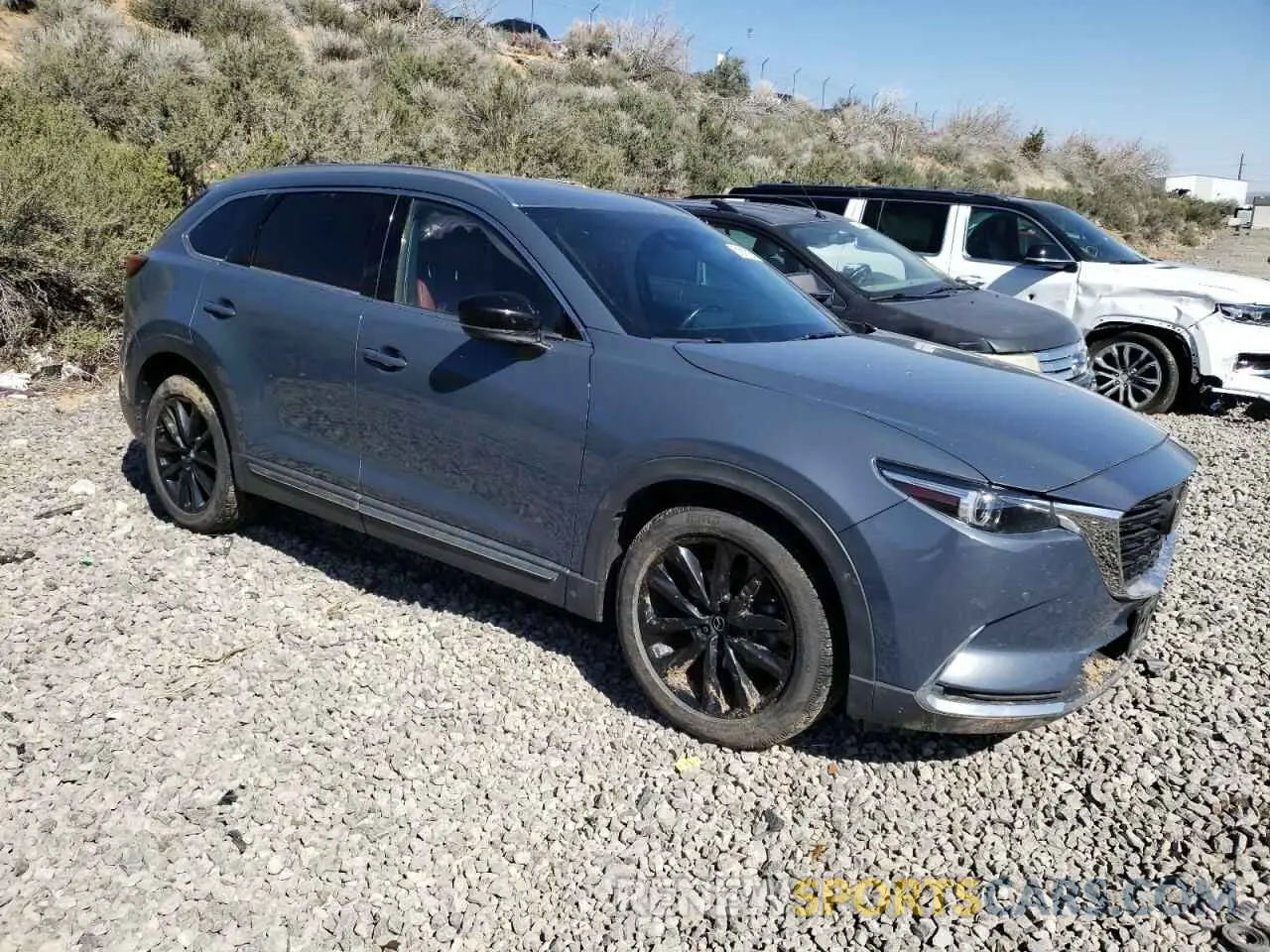4 Photograph of a damaged car JM3TCBDY5N0628165 MAZDA CX-9 2022
