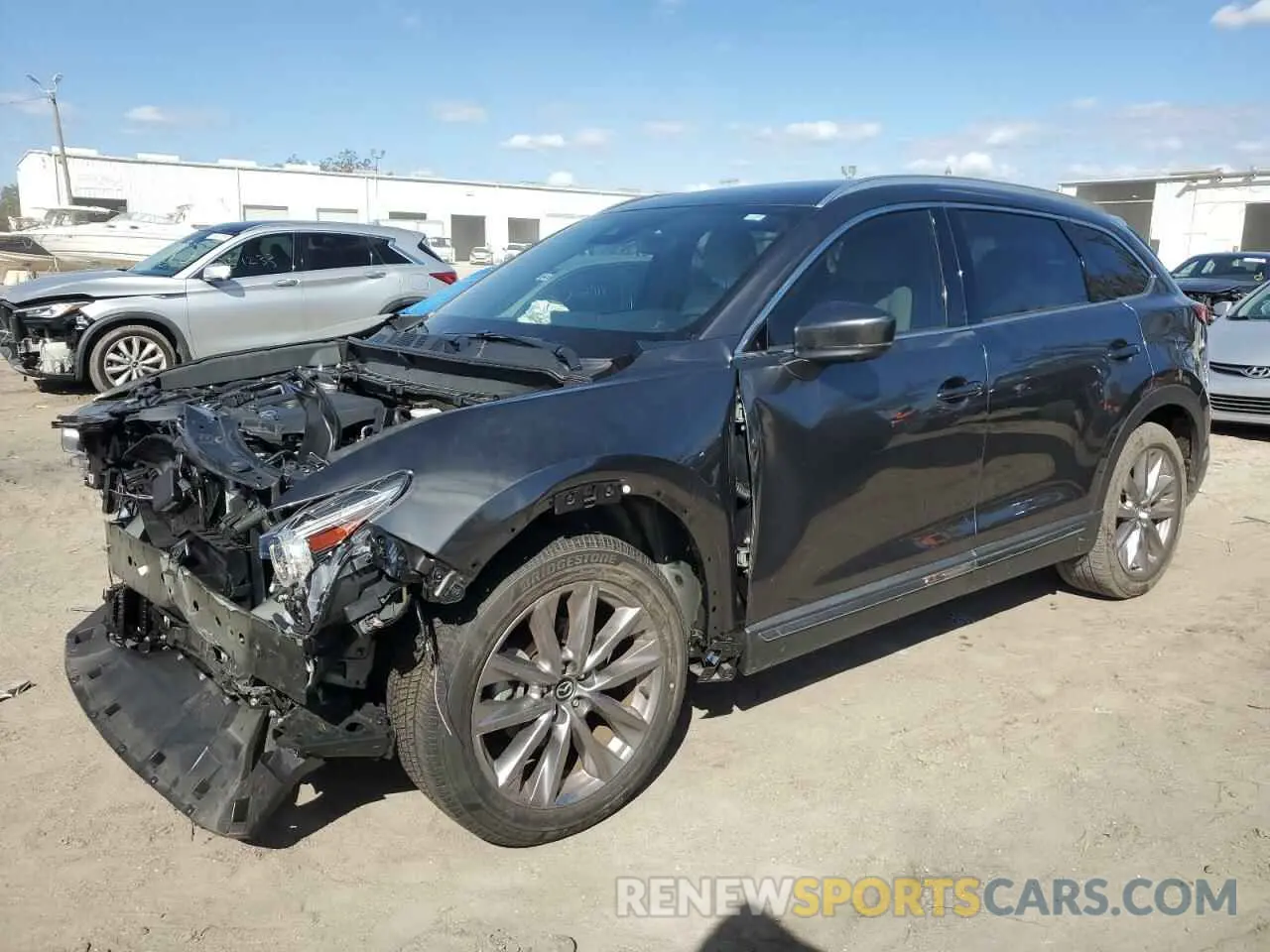 1 Photograph of a damaged car JM3TCBDY8N0613577 MAZDA CX-9 2022