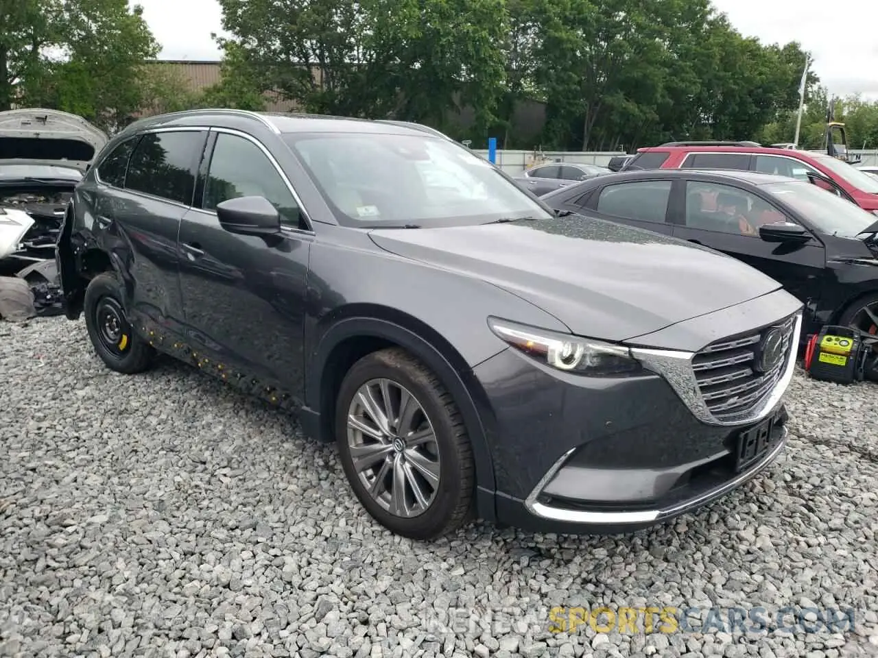 4 Photograph of a damaged car JM3TCBEY0N0618478 MAZDA CX-9 2022