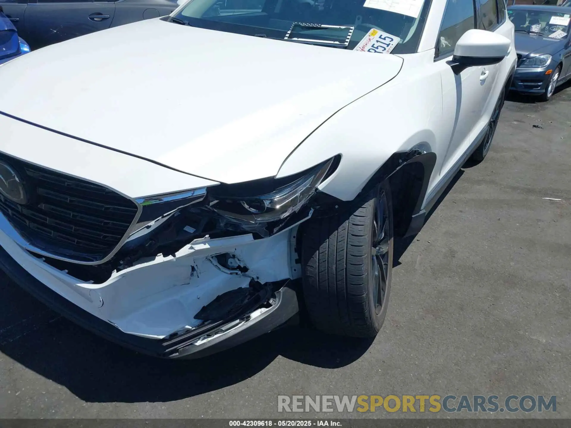 6 Photograph of a damaged car JM3TCBAY7P0636047 MAZDA CX-9 2023