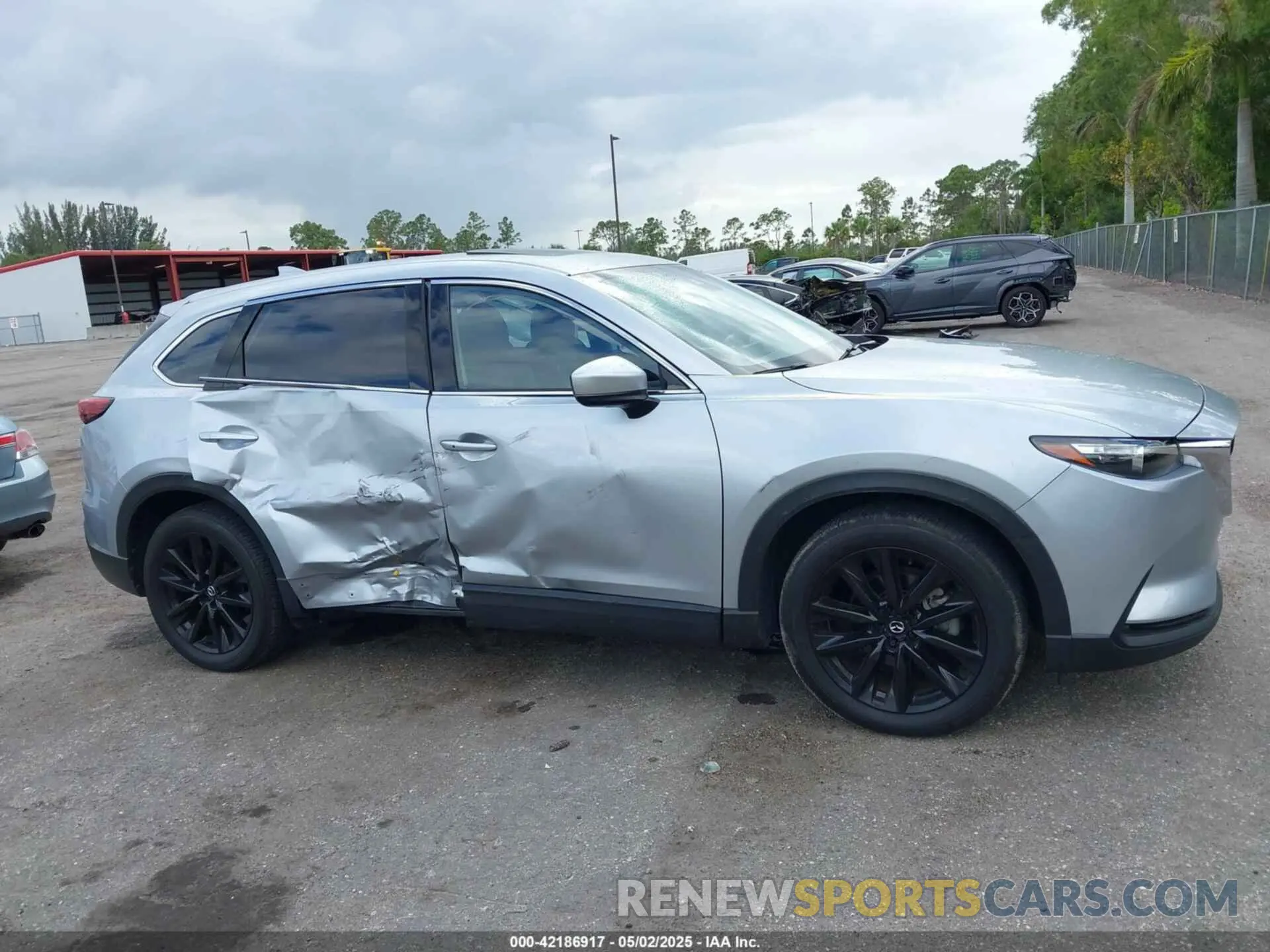 6 Photograph of a damaged car JM3TCBAY7P0652913 MAZDA CX-9 2023