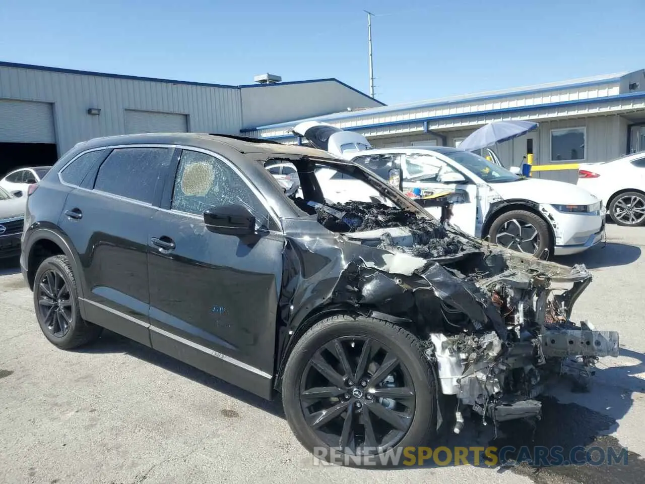 4 Photograph of a damaged car JM3TCBAY8P0643847 MAZDA CX-9 2023