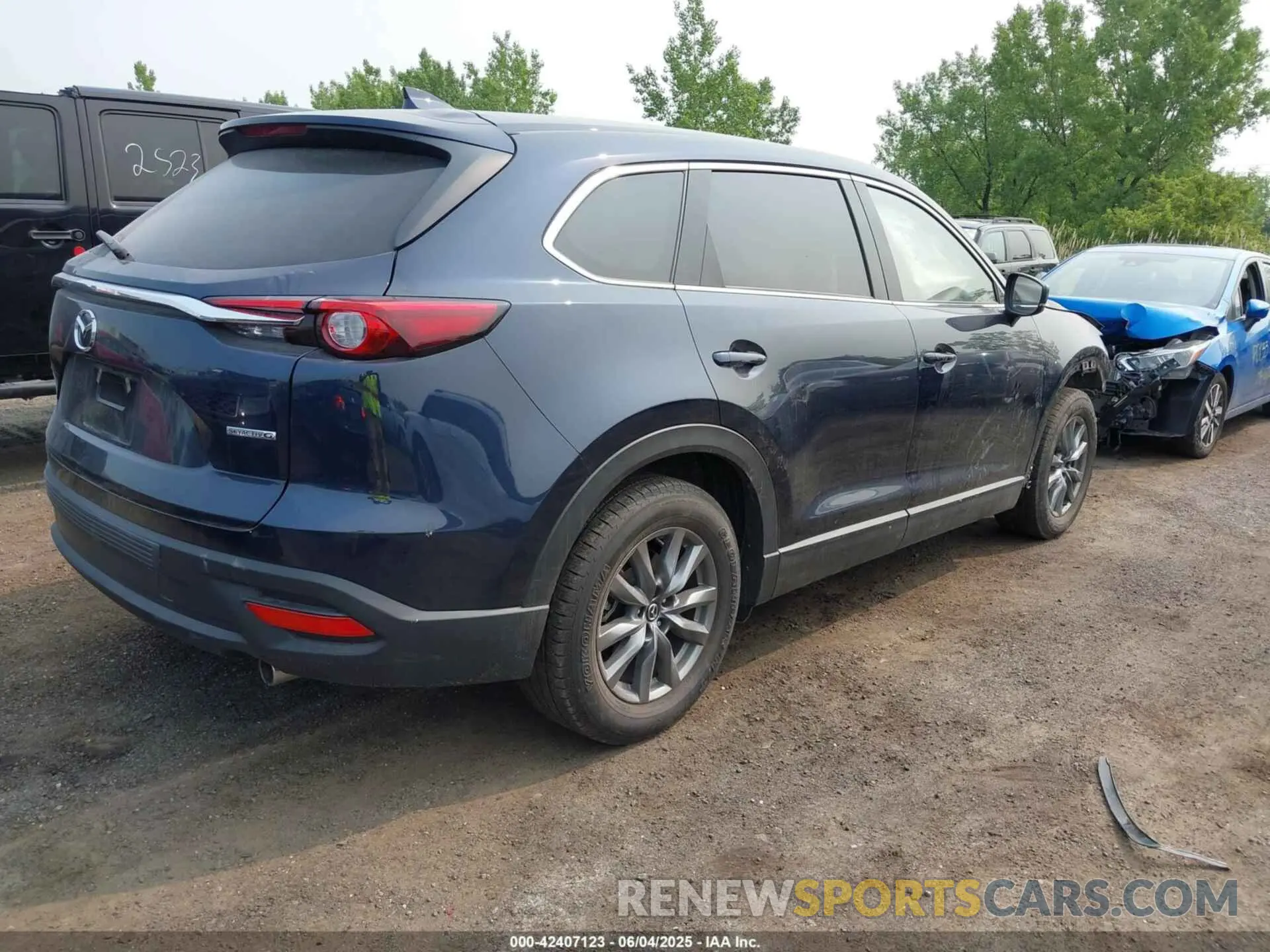 4 Photograph of a damaged car JM3TCBCY6P0642838 MAZDA CX-9 2023