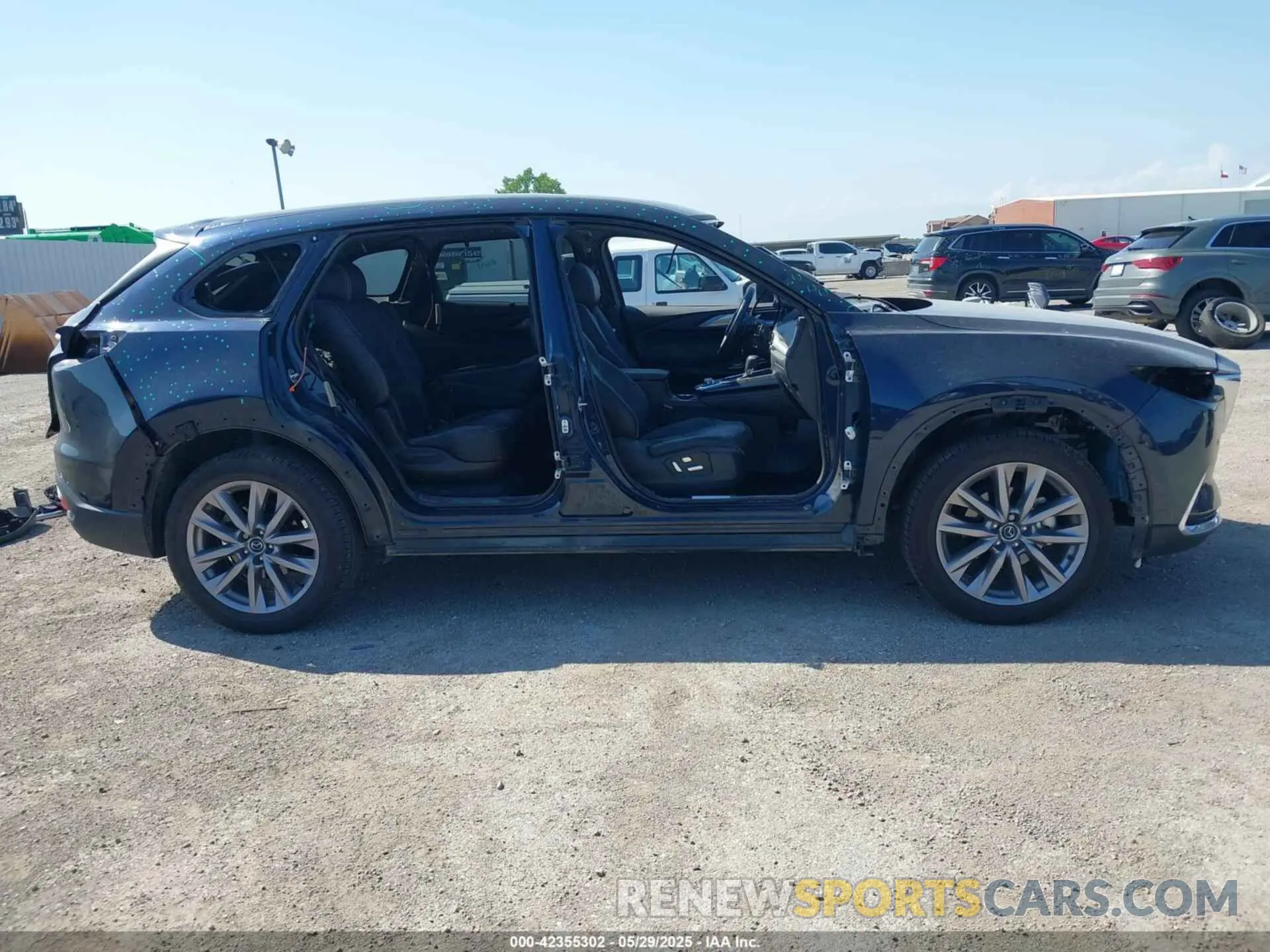 14 Photograph of a damaged car JM3TCBDY0P0634703 MAZDA CX-9 2023
