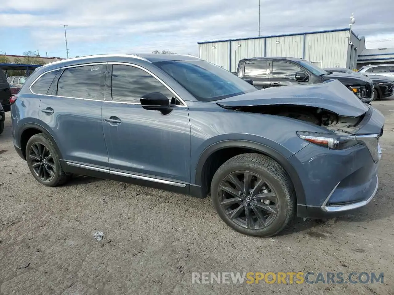 4 Photograph of a damaged car JM3TCBDY0P0650772 MAZDA CX-9 2023