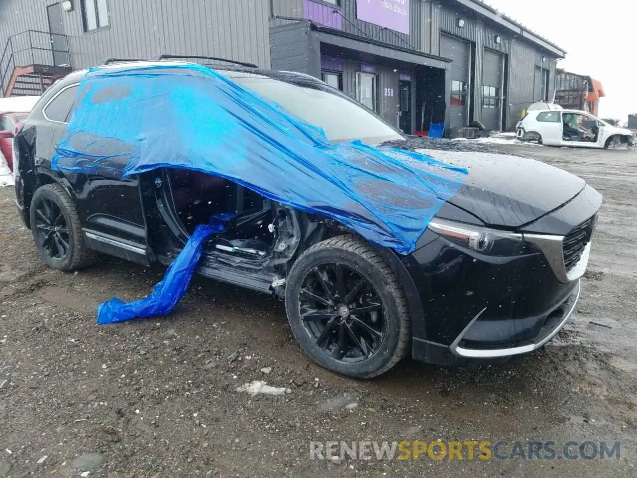 4 Photograph of a damaged car JM3TCBDY1P0644673 MAZDA CX-9 2023