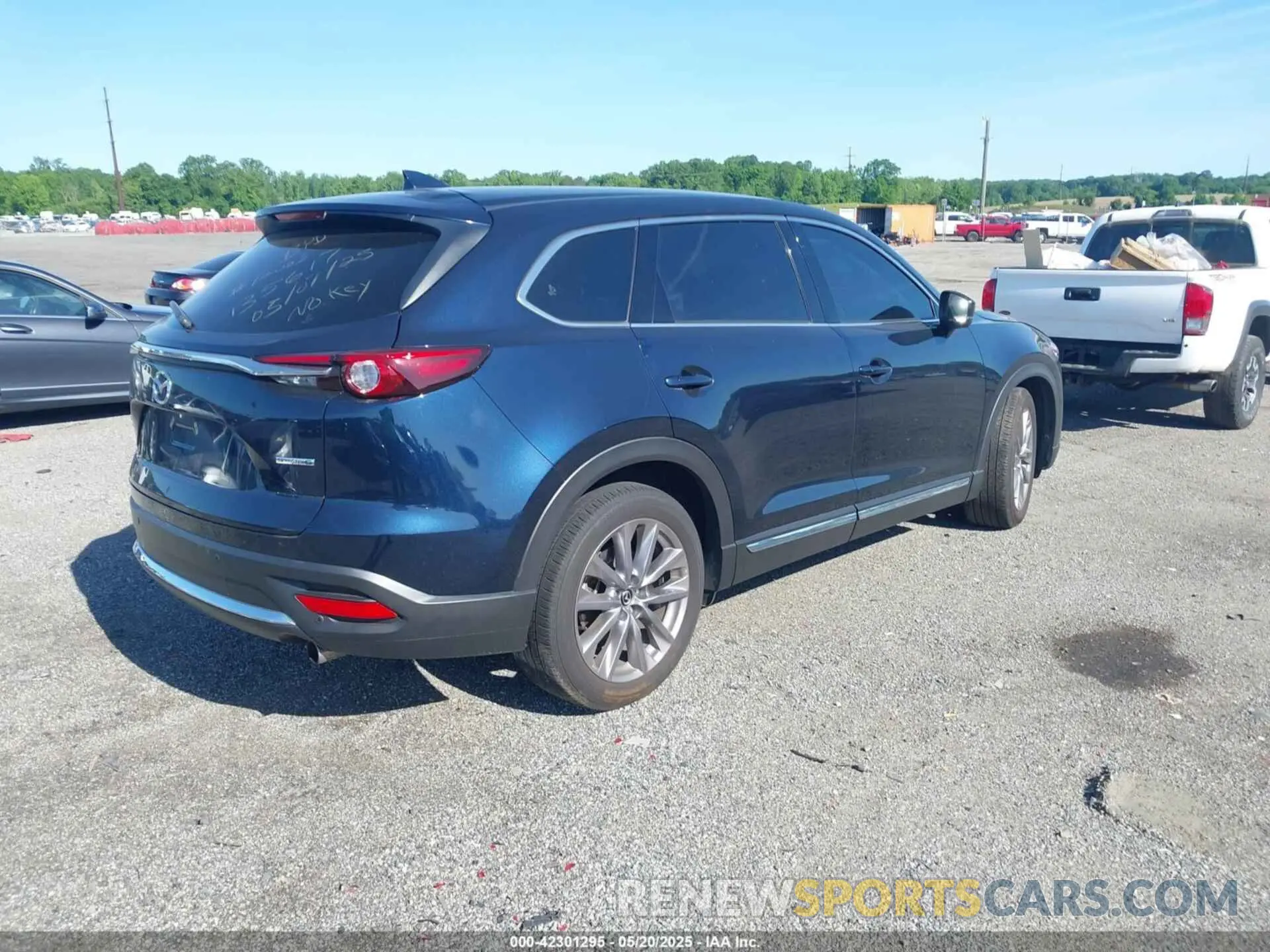 4 Photograph of a damaged car JM3TCBDY9P0633470 MAZDA CX-9 2023