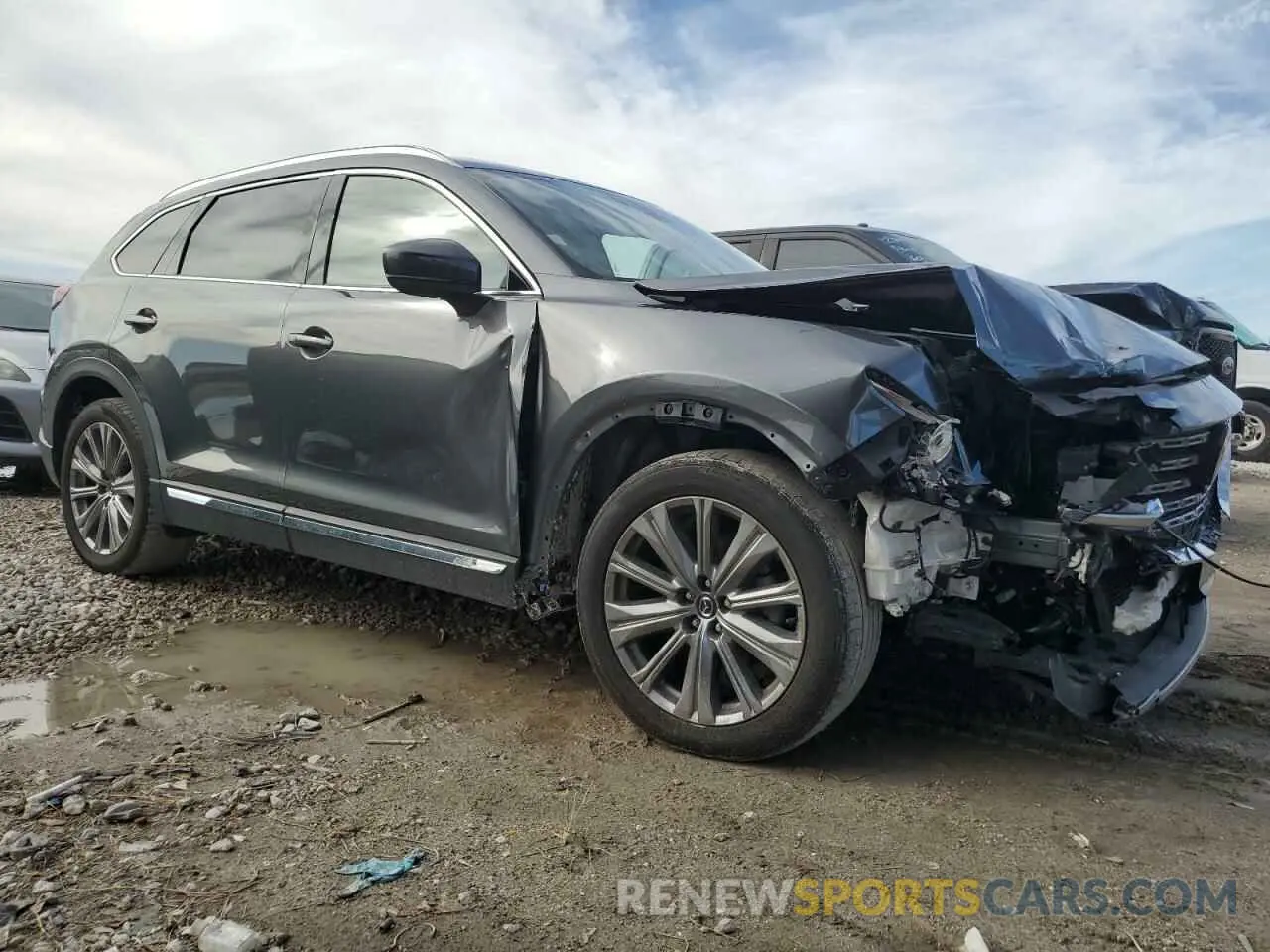 4 Photograph of a damaged car JM3TCBEYXP0632844 MAZDA CX-9 2023