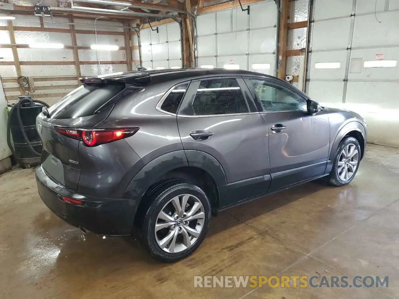3 Photograph of a damaged car 3MVDMBDL3LM104682 MAZDA CX30 2020