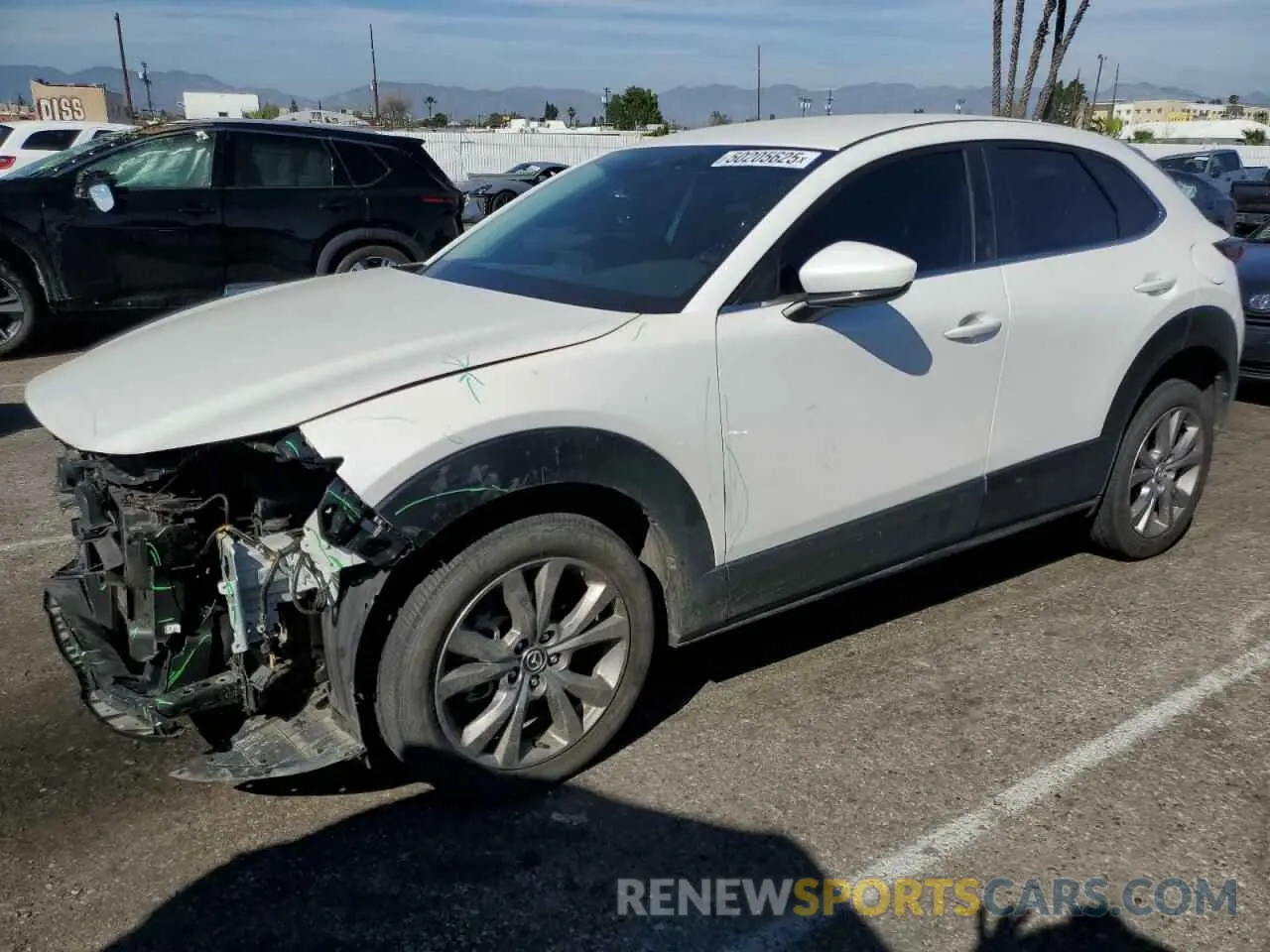 1 Photograph of a damaged car 3MVDMABL2MM210703 MAZDA CX30 2021