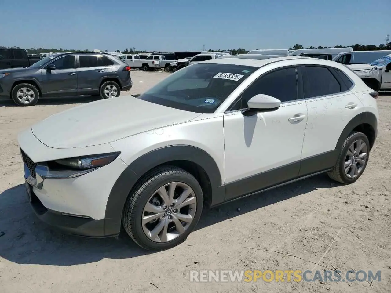 1 Photograph of a damaged car 3MVDMACL4MM208868 MAZDA CX30 2021