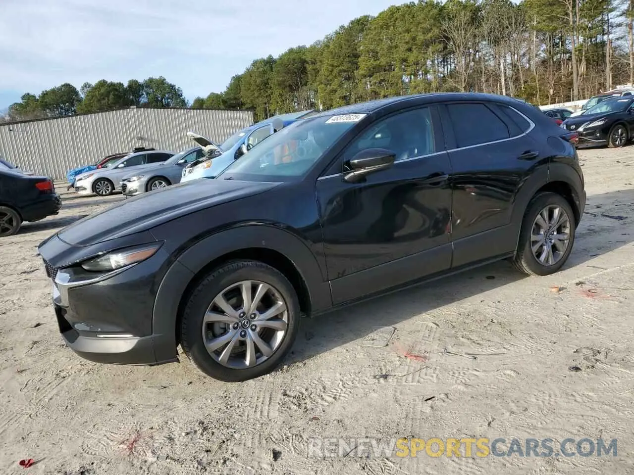 1 Photograph of a damaged car 3MVDMBBL1MM253743 MAZDA CX30 2021